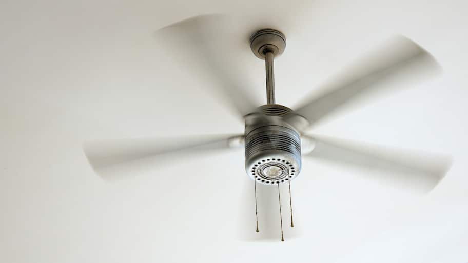 A ceiling fan spinning gently