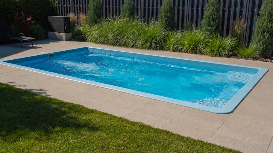 small swimming pool in backyard