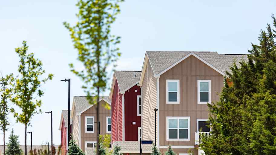 Row of Bright Multi-Colored Homes on a Sunny Summer Day