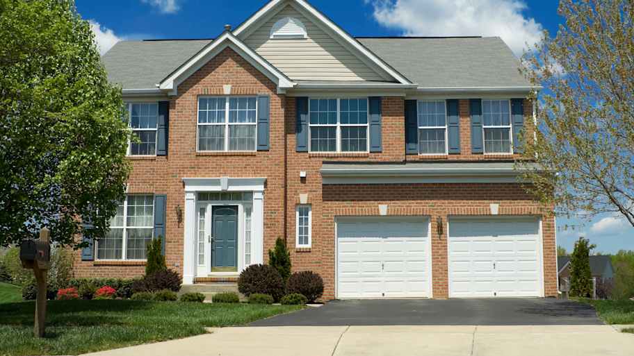 brick house with many windows in baltimore