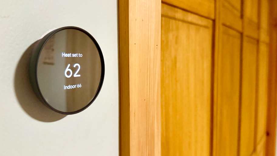 Smart thermostat mounted on the wall