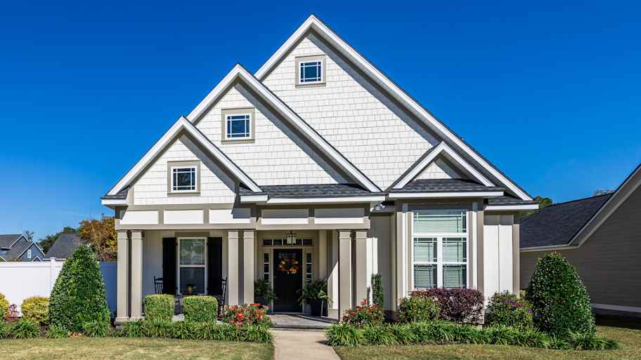 House with fiber cement siding and multi-gable roof