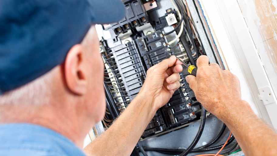 Electrician doing electrical work 