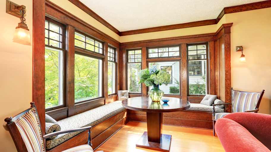 Wood crown molding installed in a cozy window nook