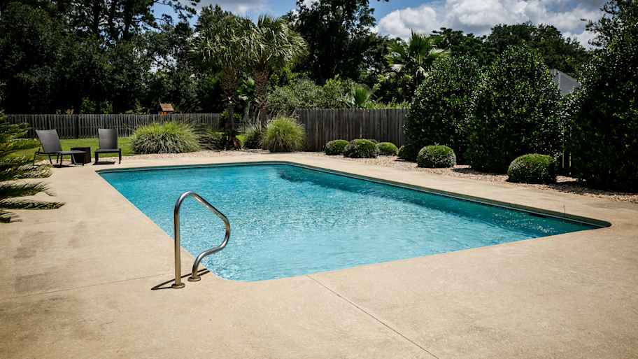 Large swimming pool in a backyard 