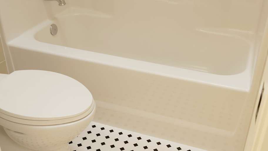 bathroom with acrylic tub