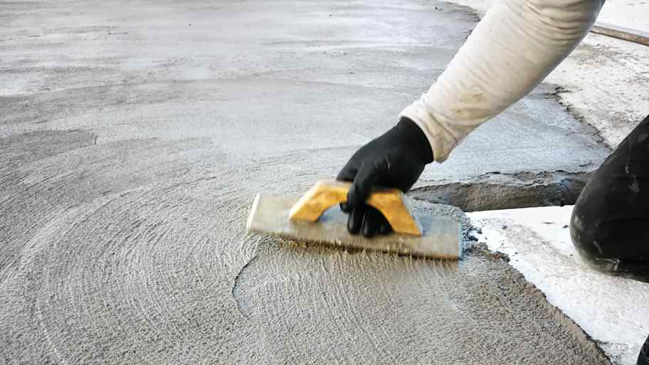 Fresh cement with a smoothing trowel