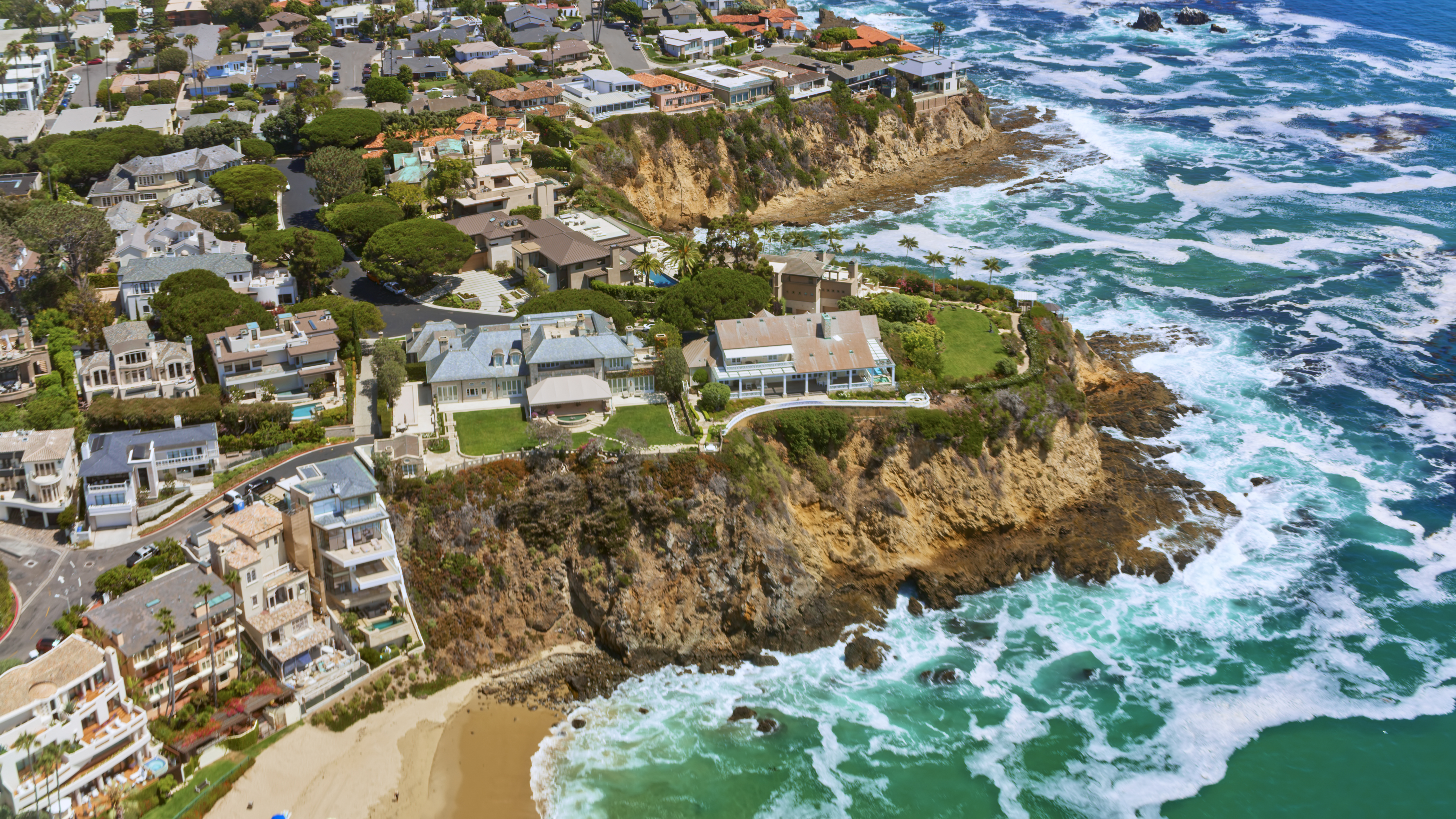 A coastal residential district showcases homes potentially requiring earthquake retrofitting to strengthen structures against seismic activity.