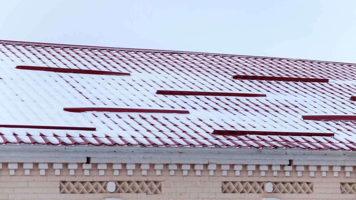 Snow guards on a tiled roof
