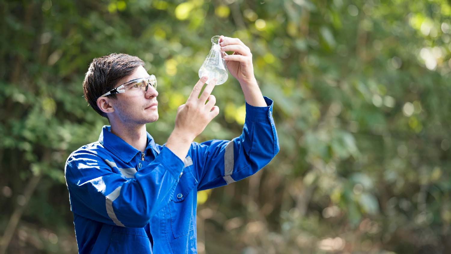 A biologist testing the well water