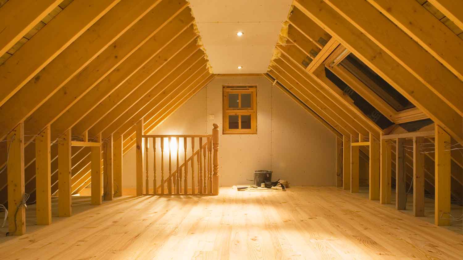 Home attic space with exposed beams