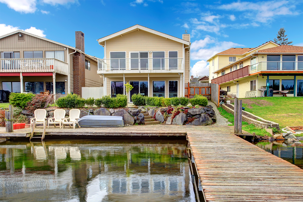 backyard view of home with dock