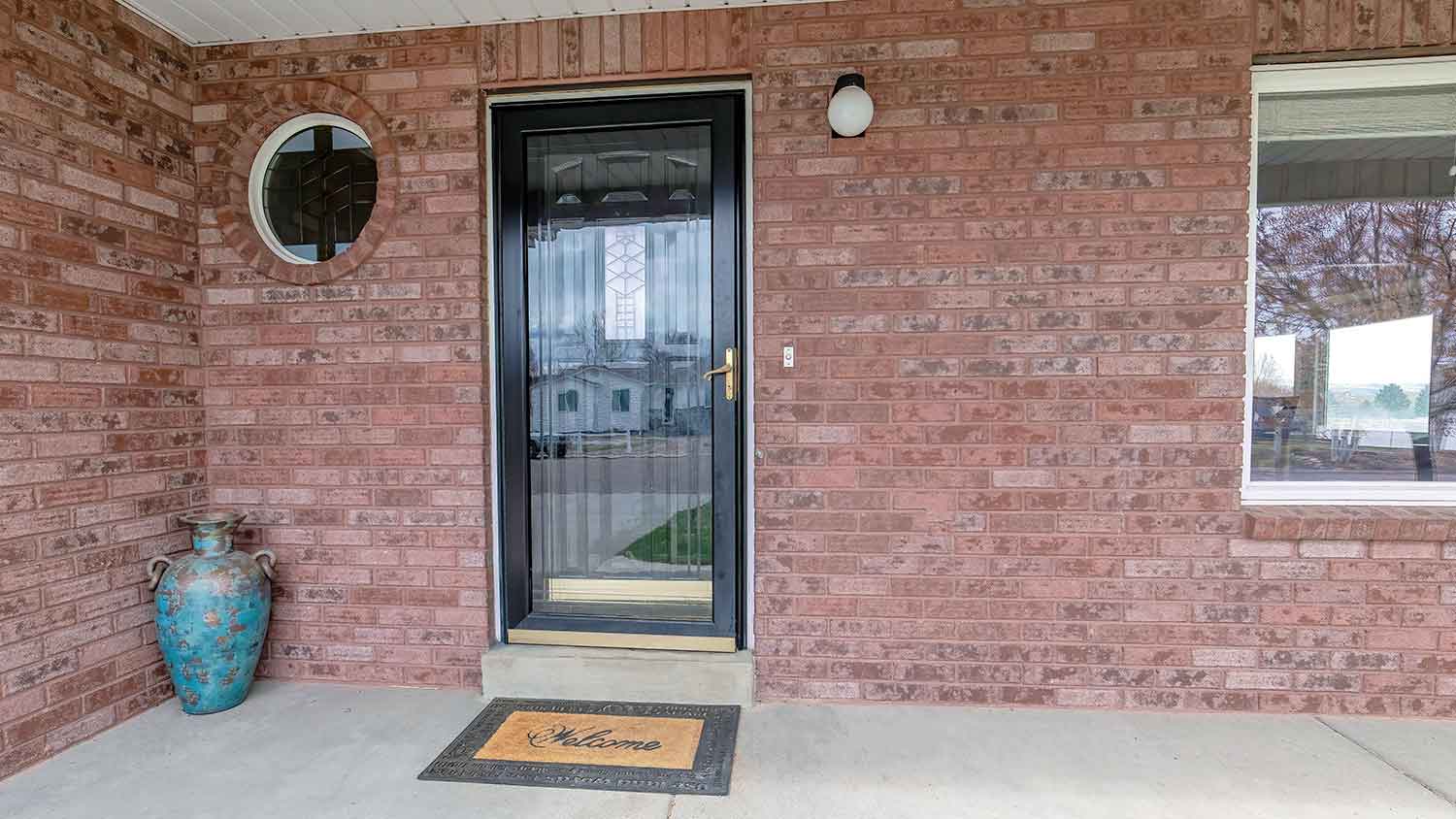House front door with glass storm door