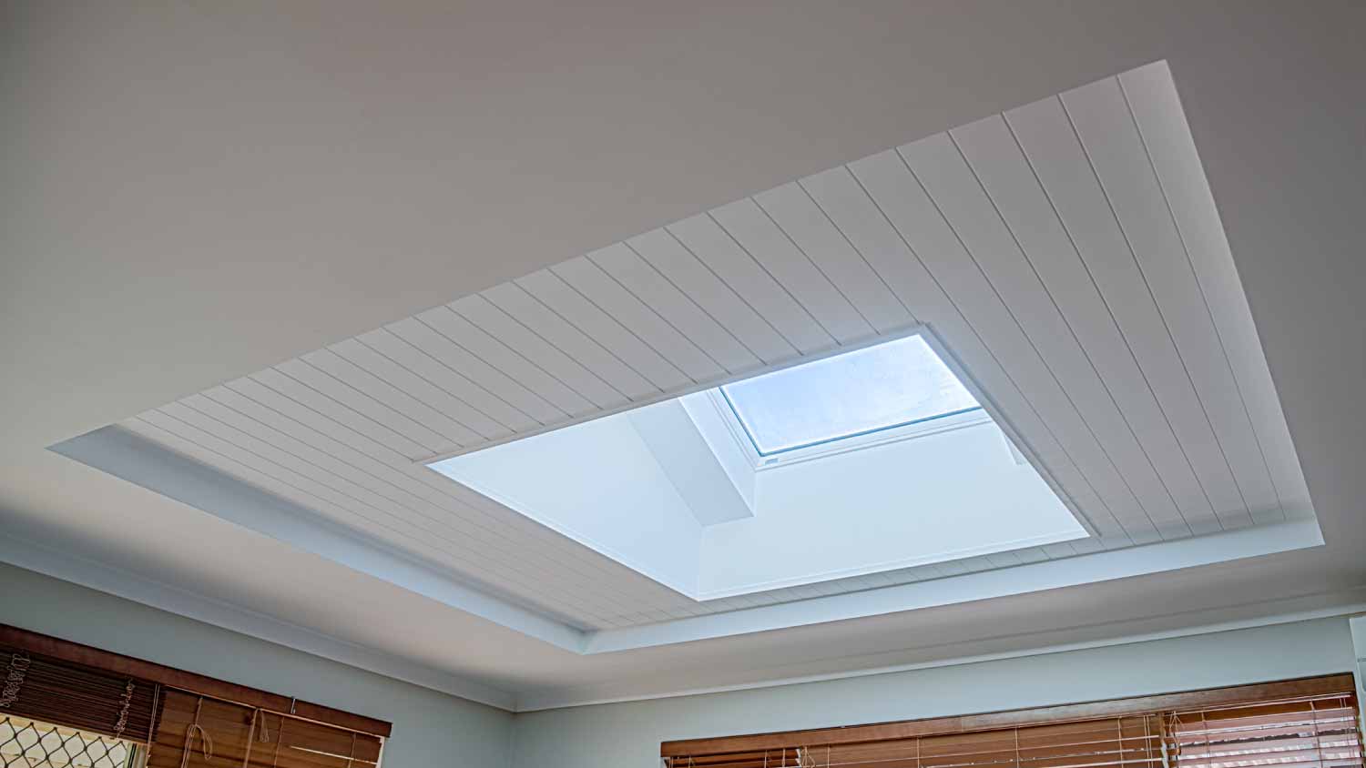 Wooden ceiling with skylight