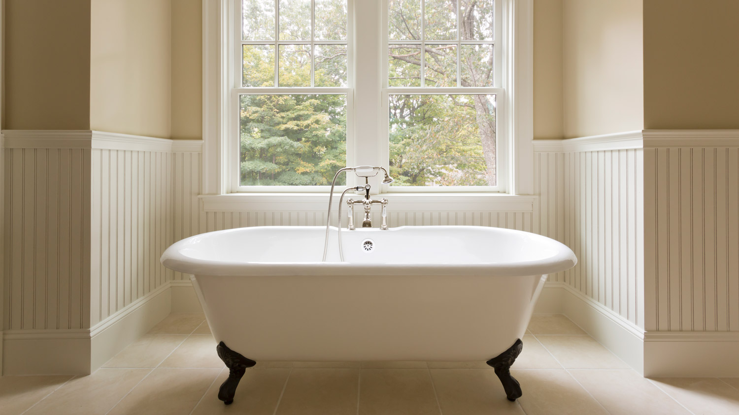 A clawfoot bathtub in a custom bathroom