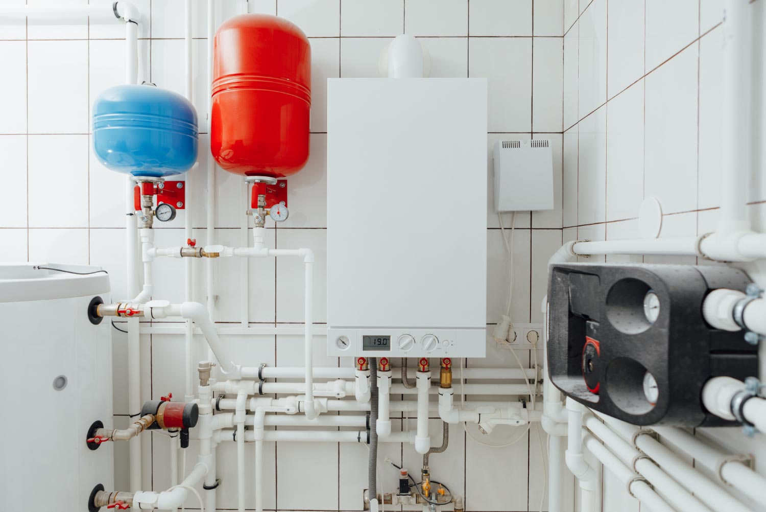 Modern independent tankless water heater in a room