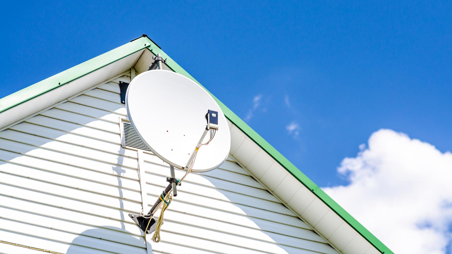 A satellite dish on a house