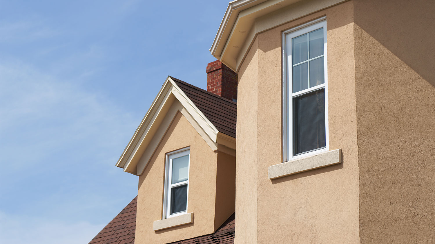 A view of a stucco house