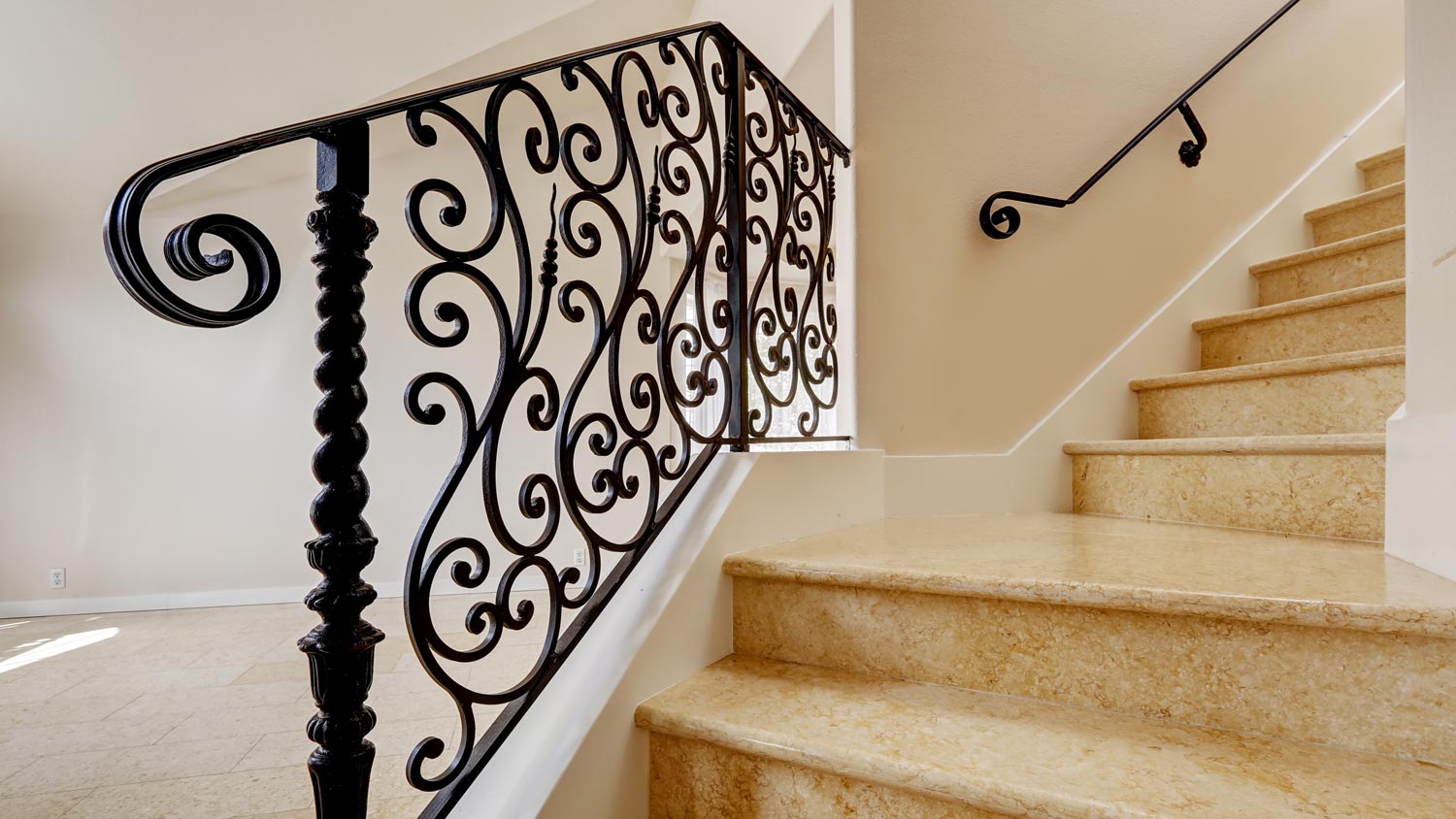 Detail of  wrought iron railing on a staircase