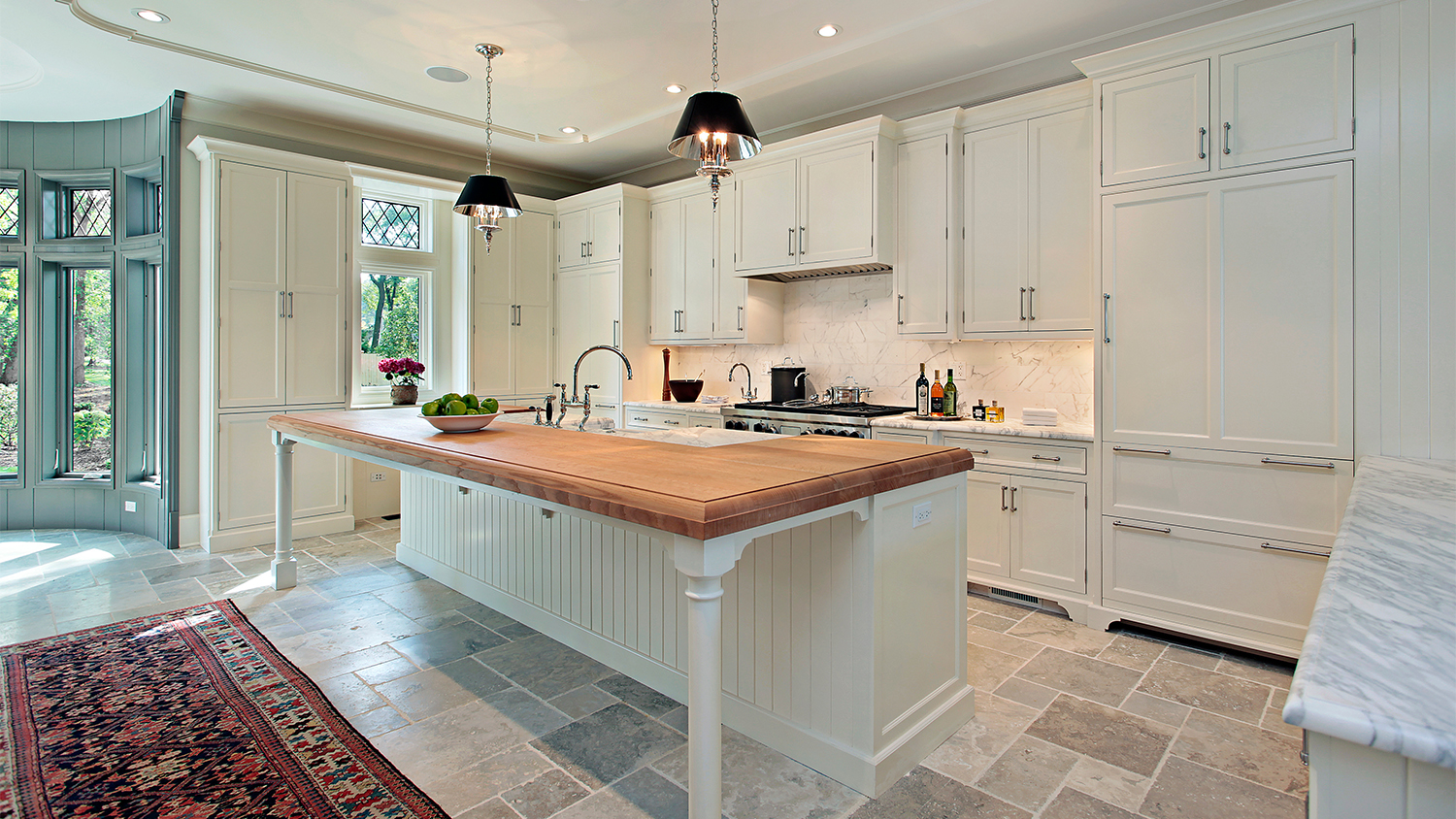 white kitchen with grey tiled floor