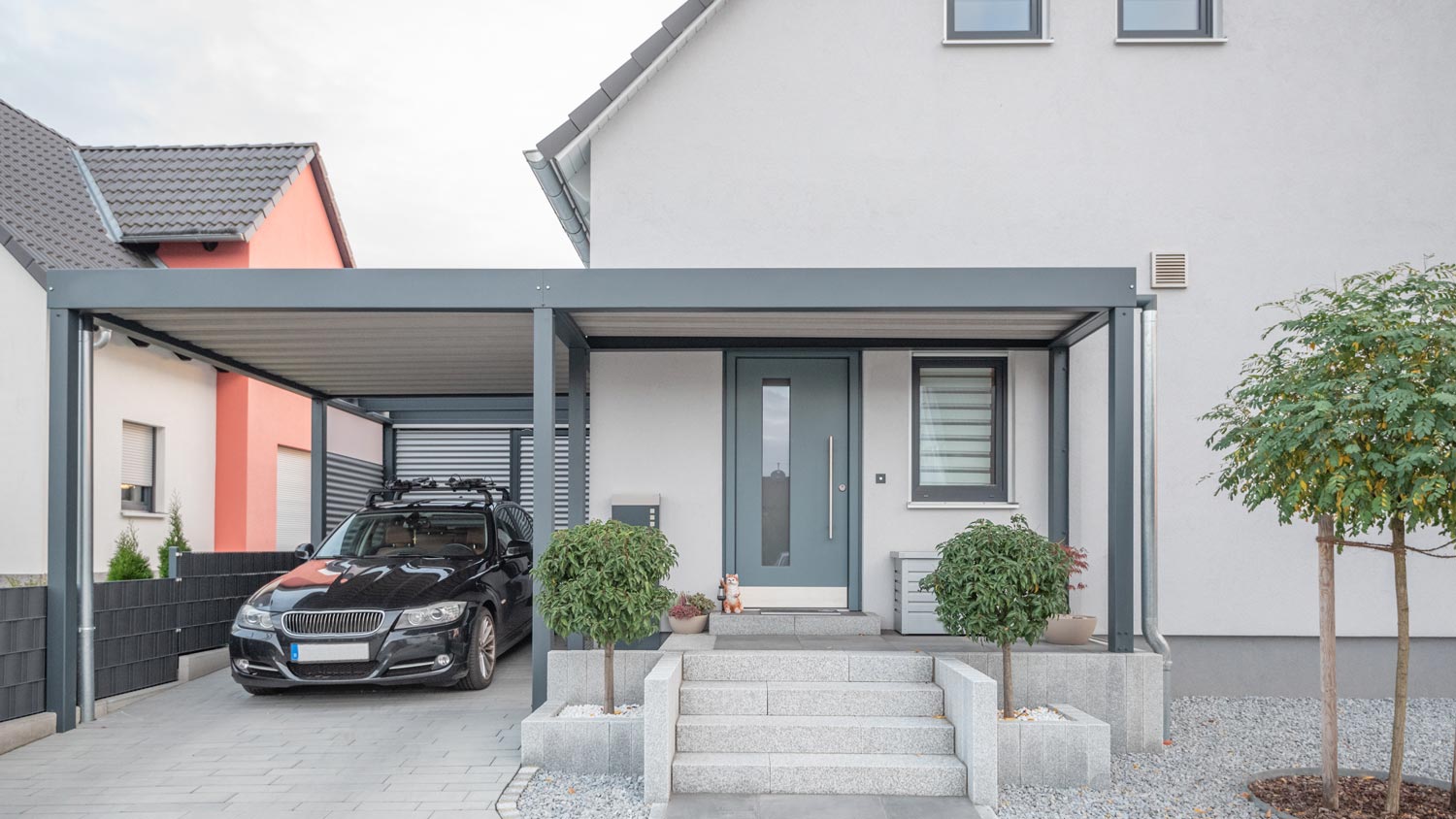 A metal carport on a modern house