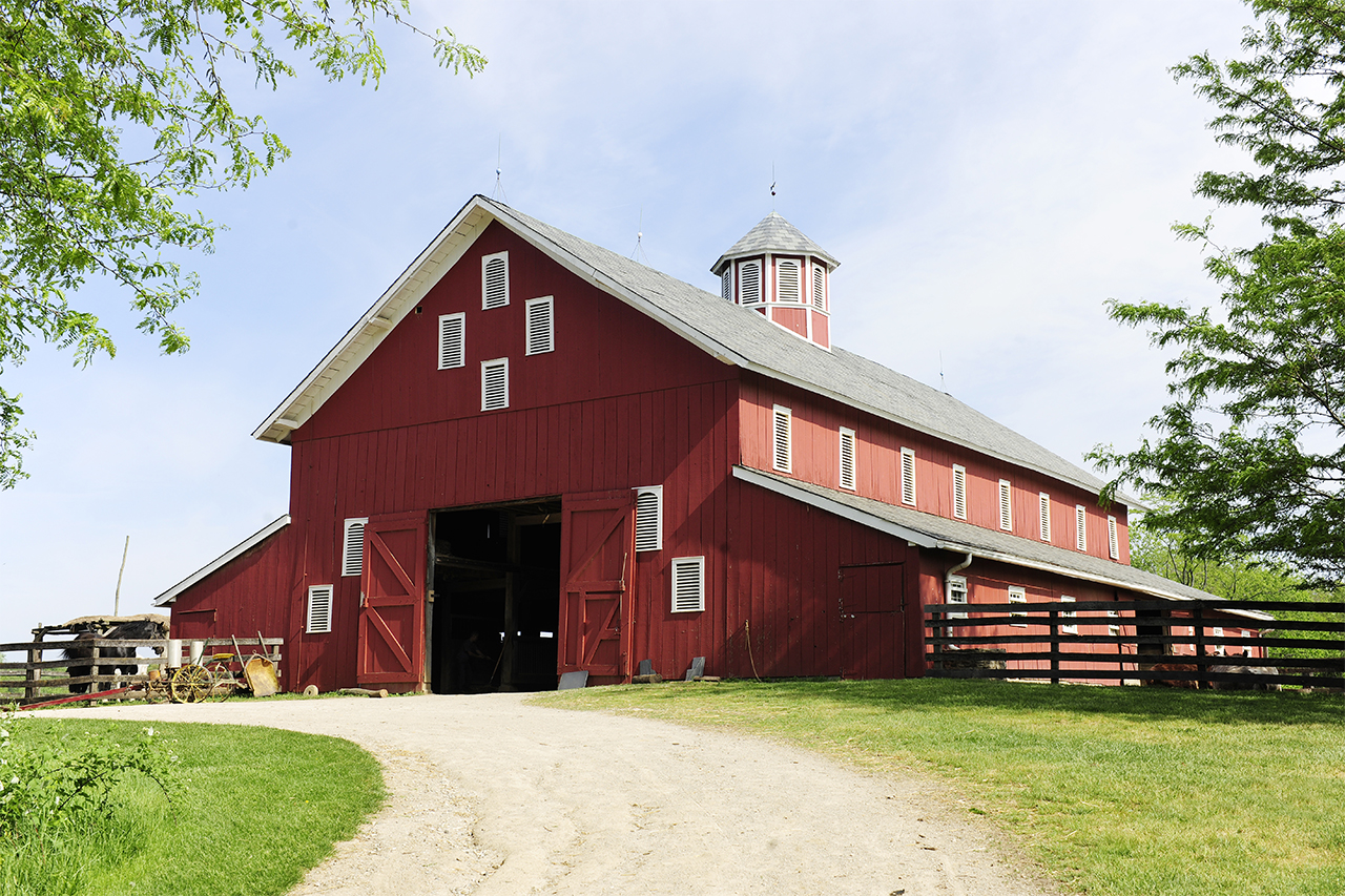 big red barn on a farm