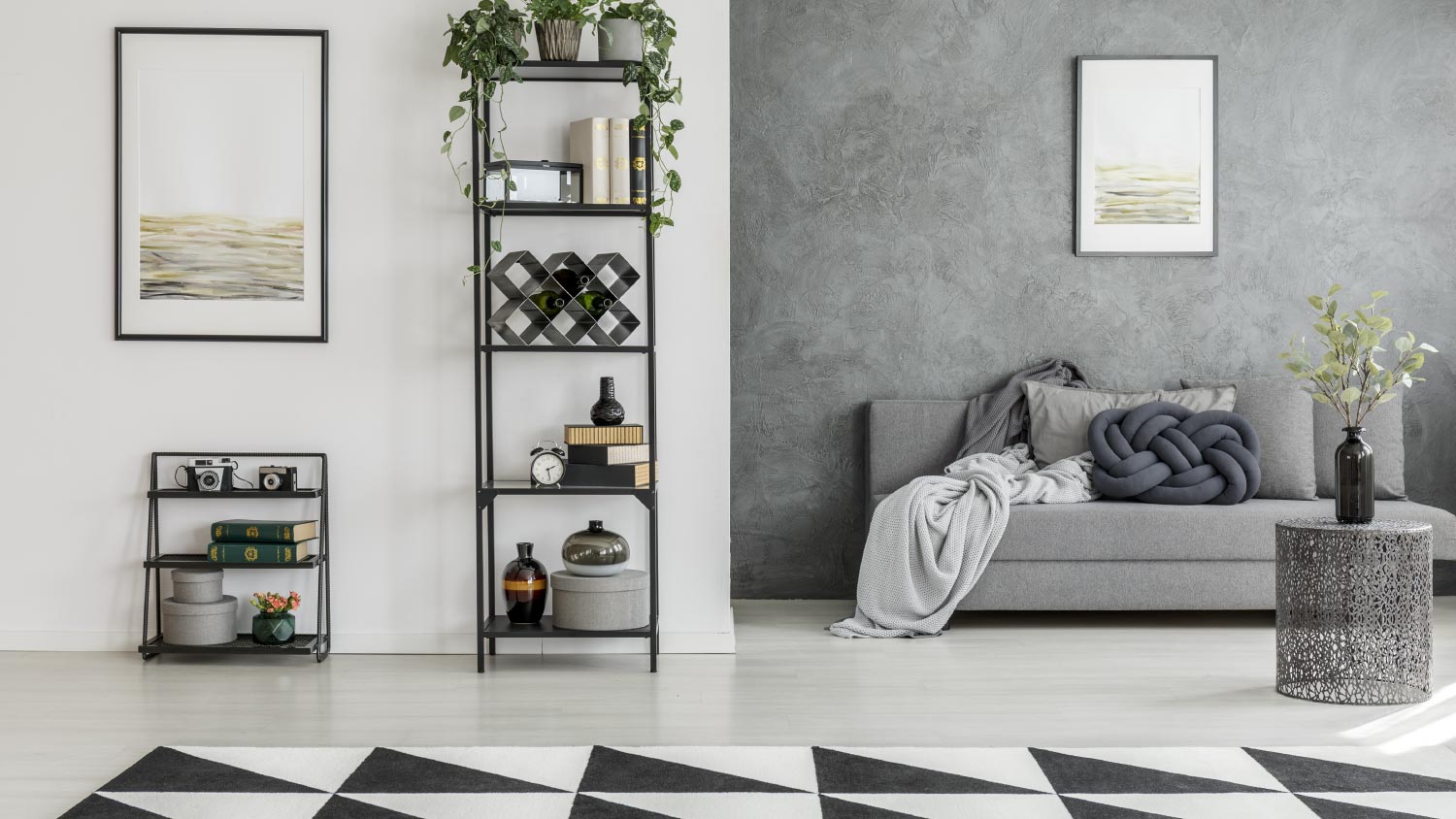 A living room with concrete wall