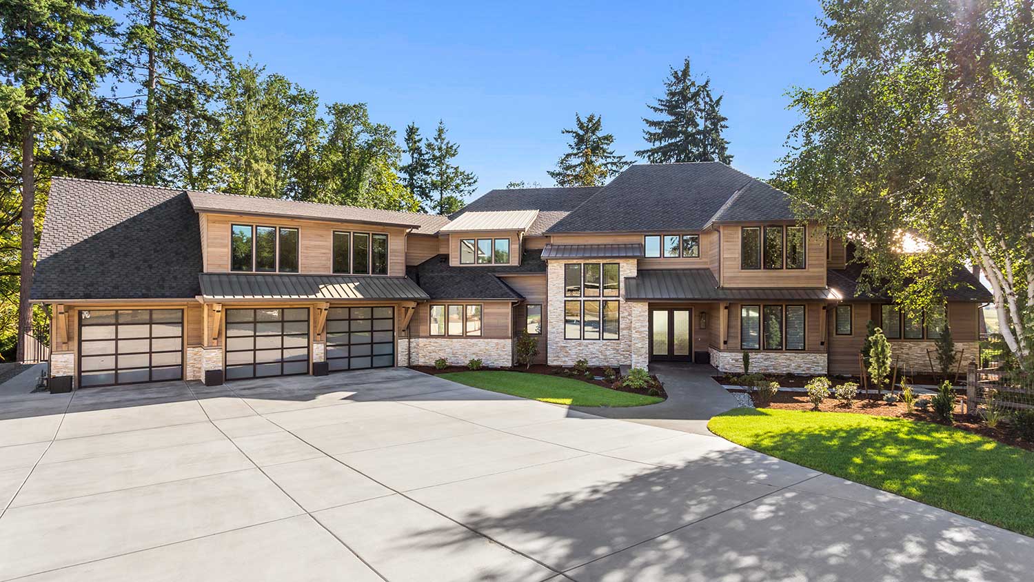 Three car garage house with large driveway