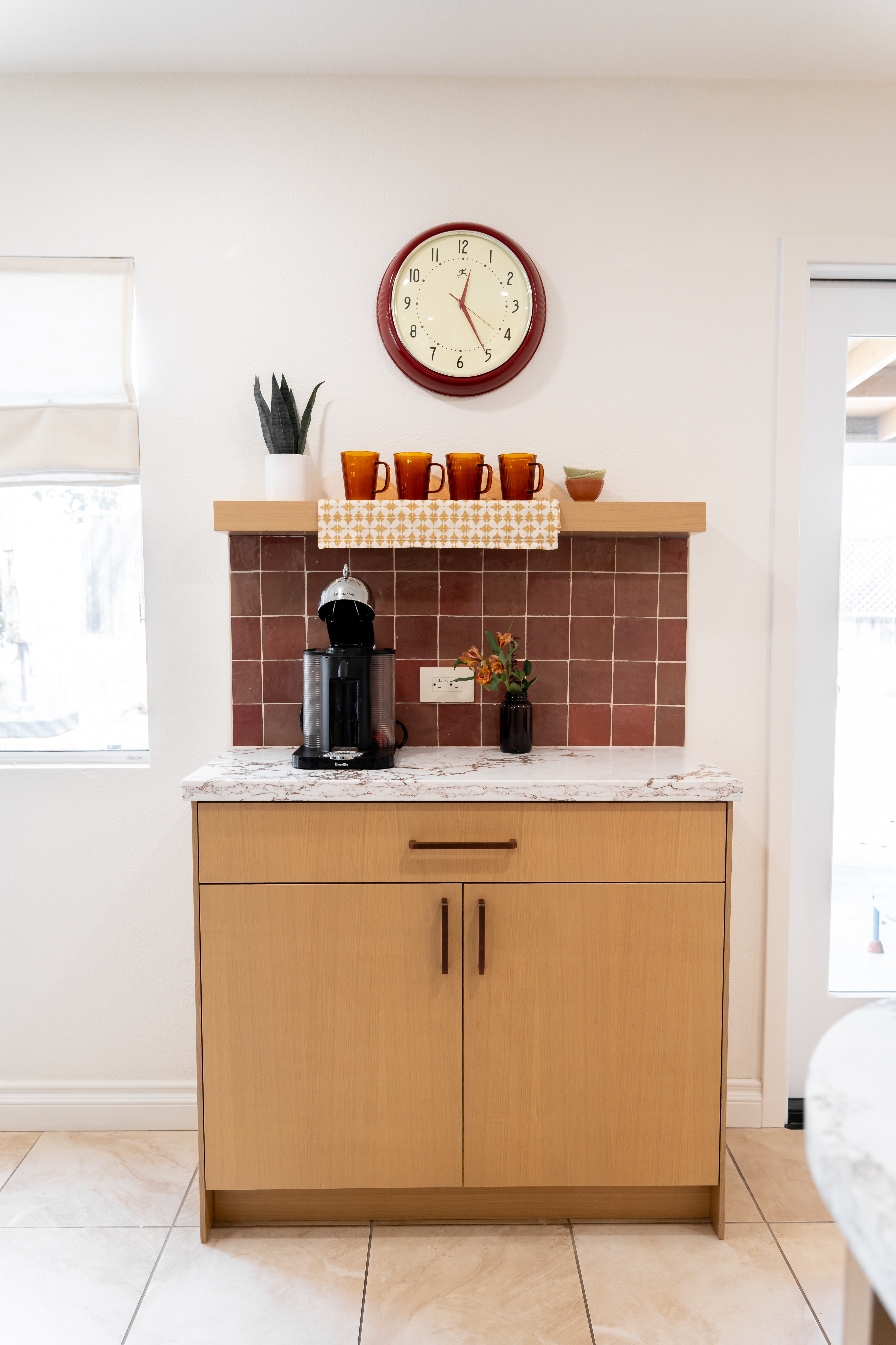 Renovated section of kitchen with counter top and lower cabinets