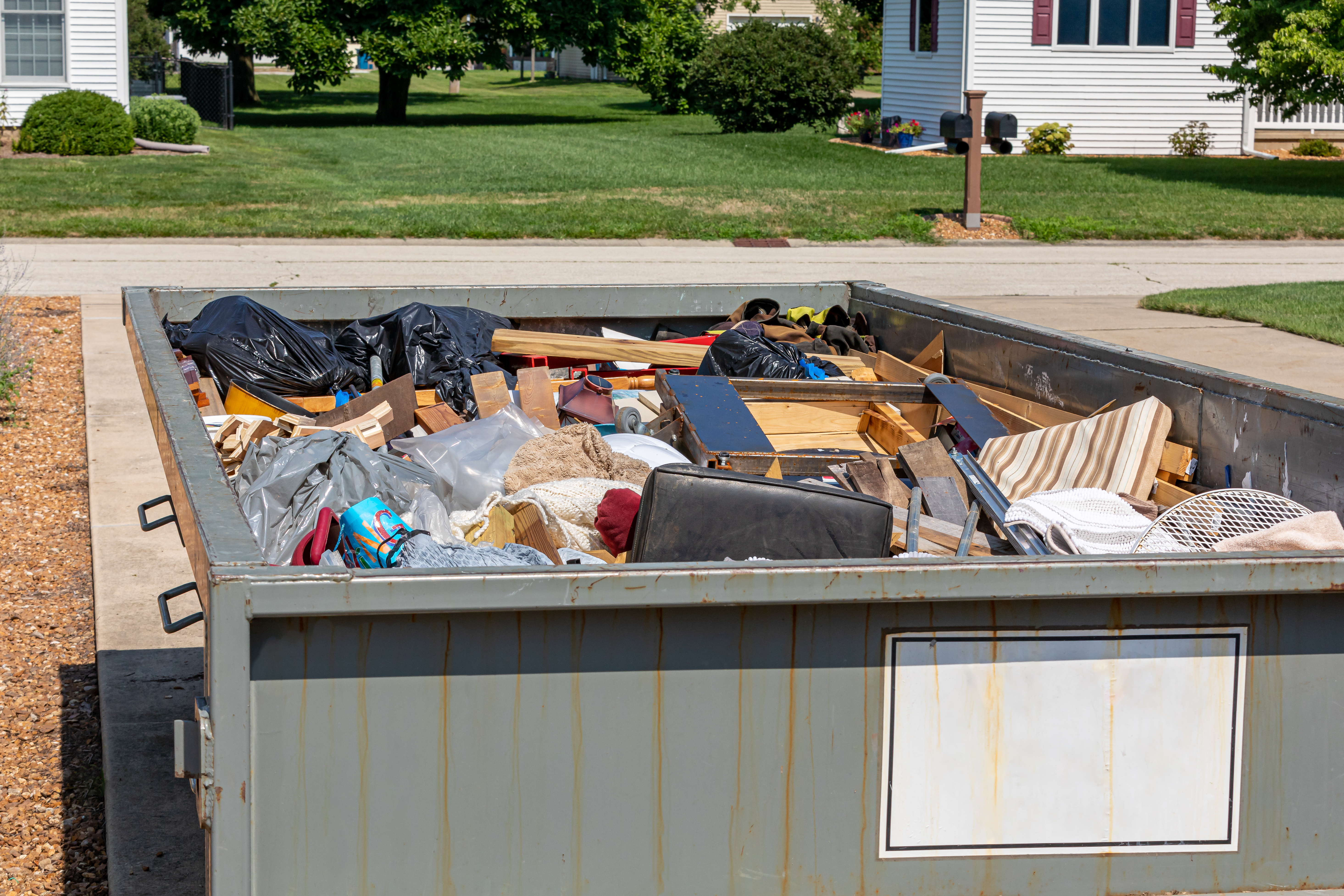 dumpster full of household junk