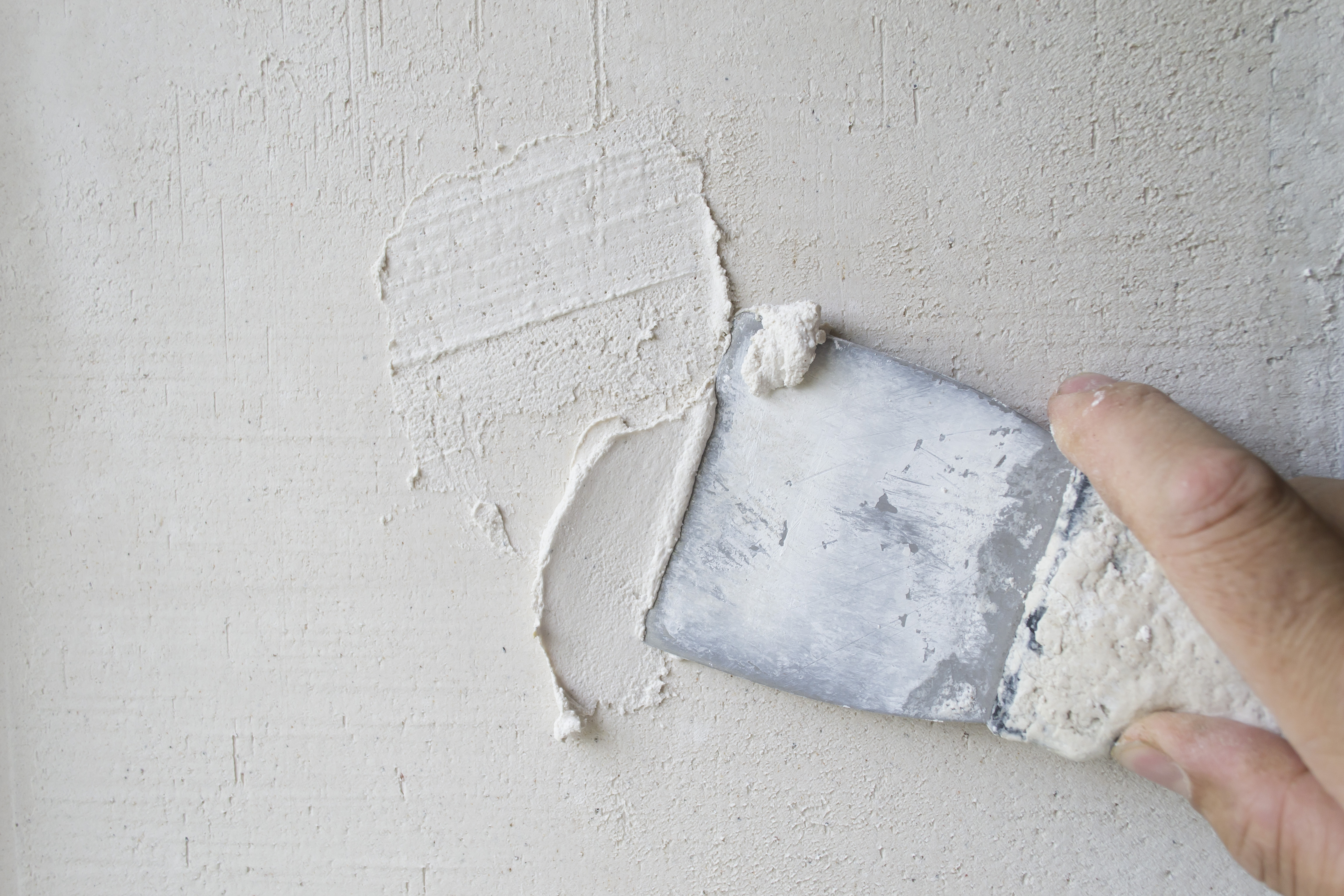 Close-up of plastering wall