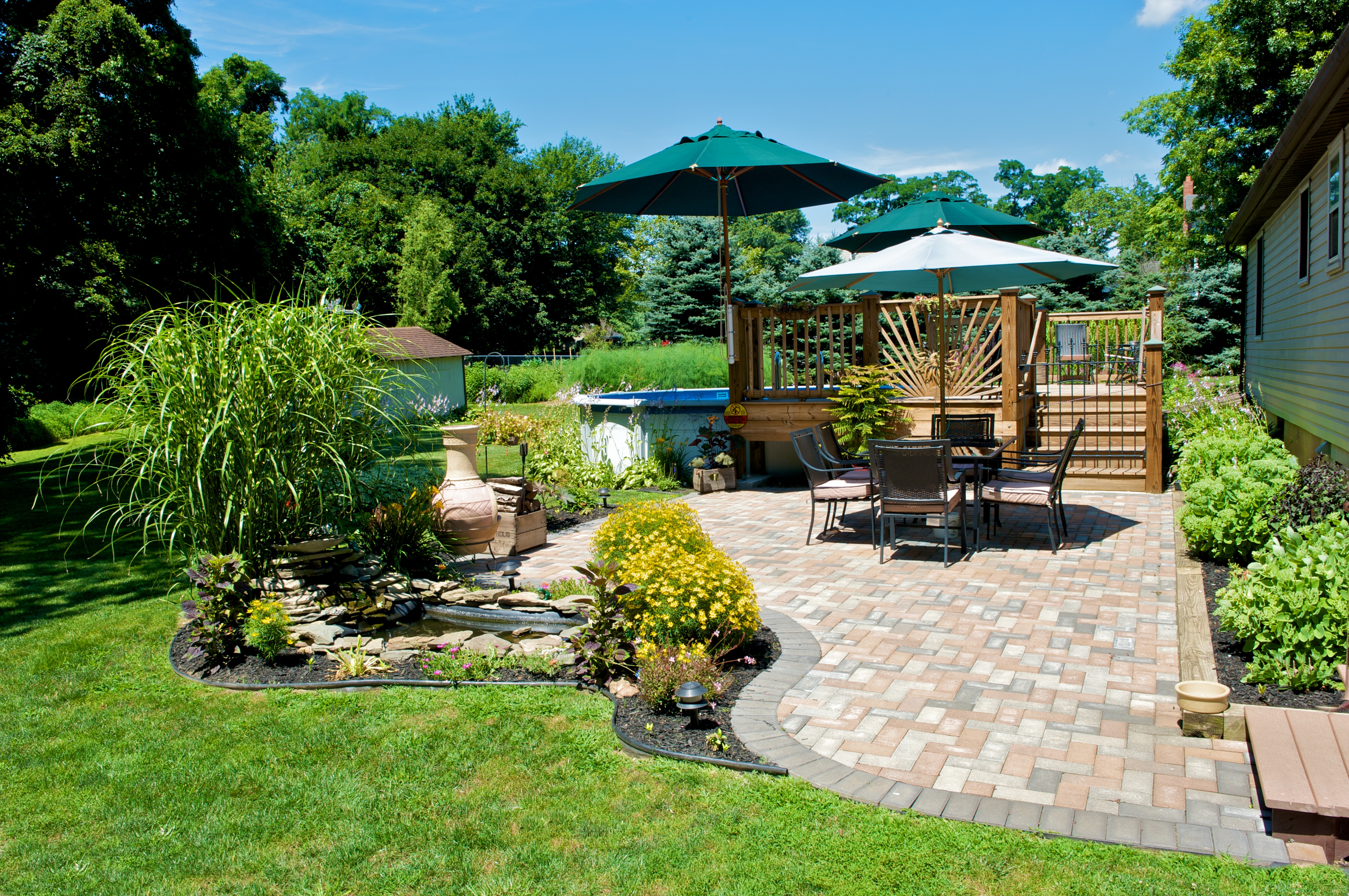 Terrace with table and sun umbrella
