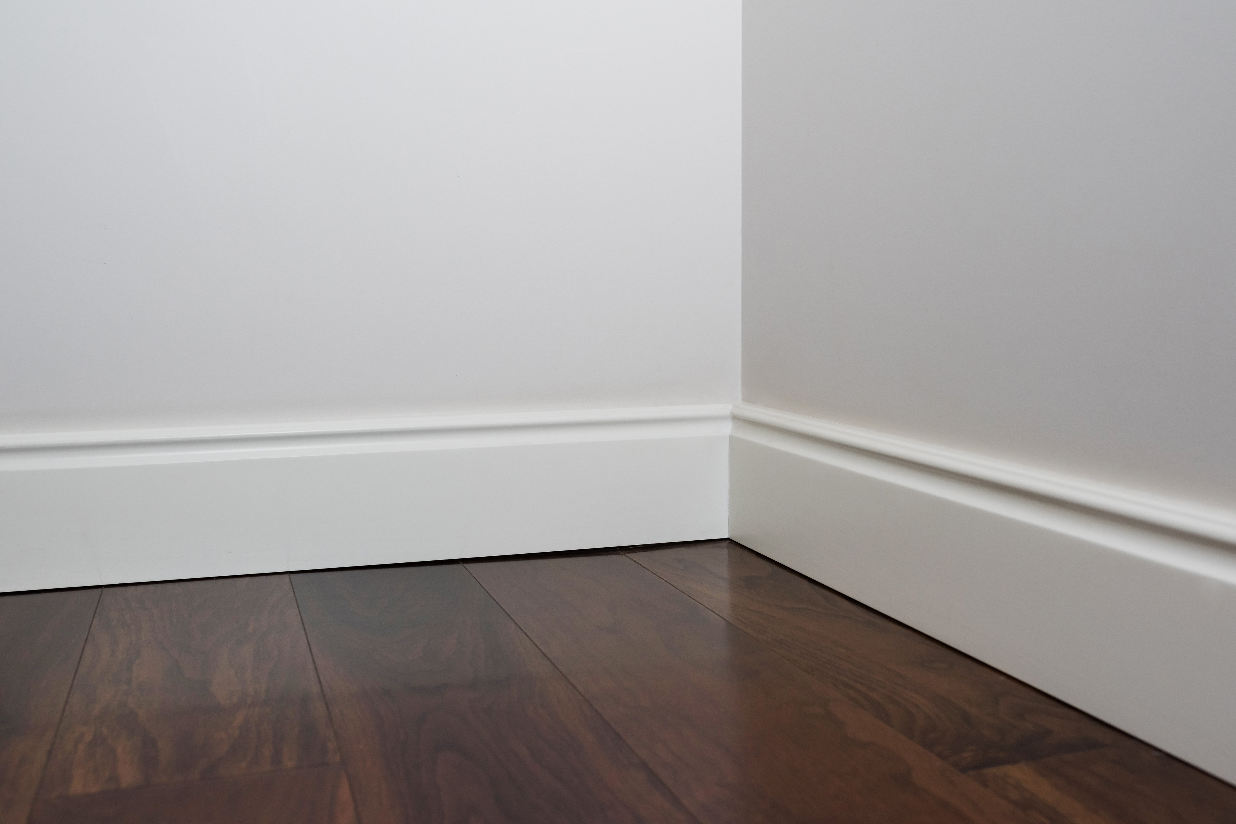 Wooden floors and white baseboards