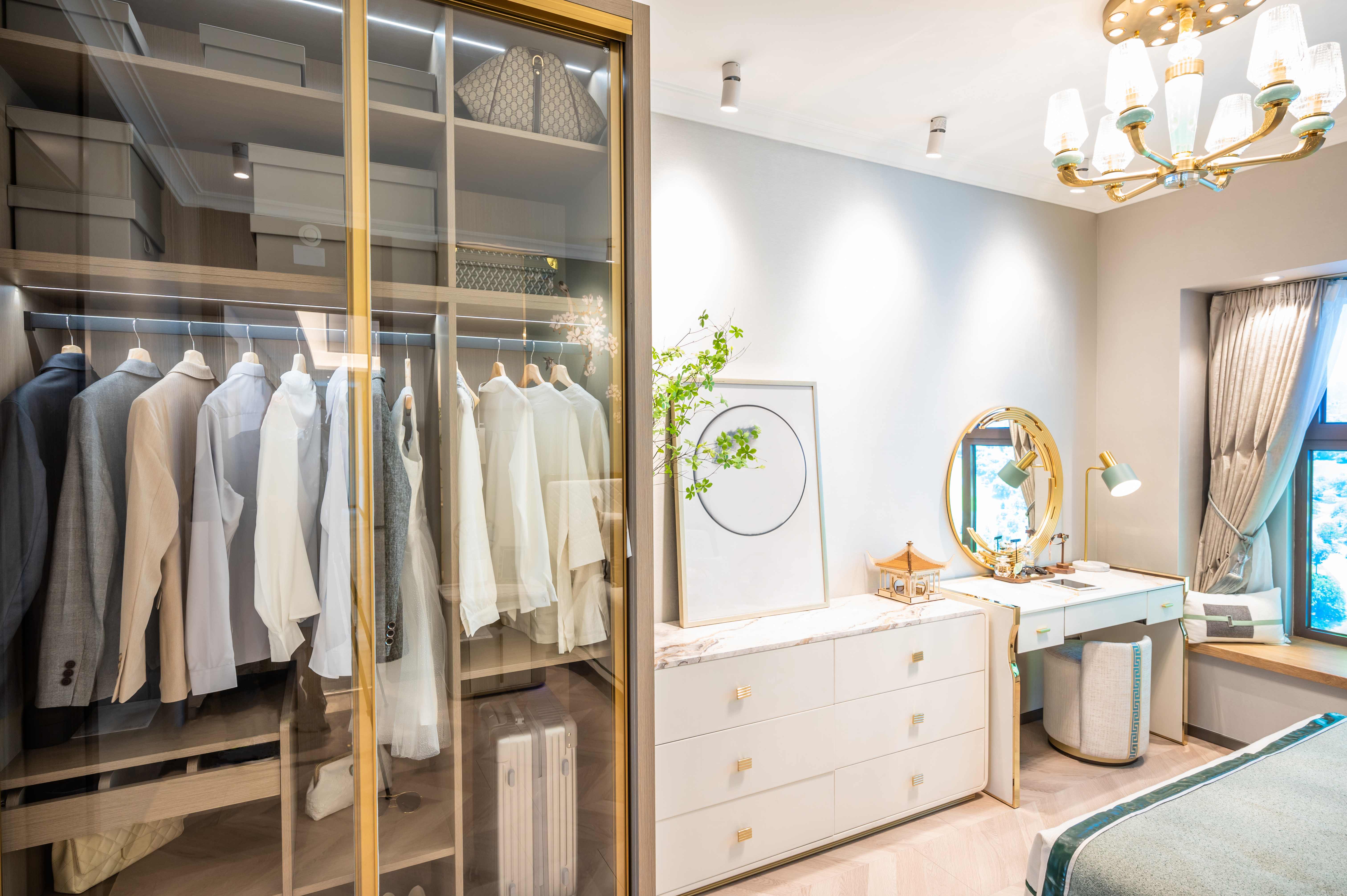 A reach-in closet with transparent doors