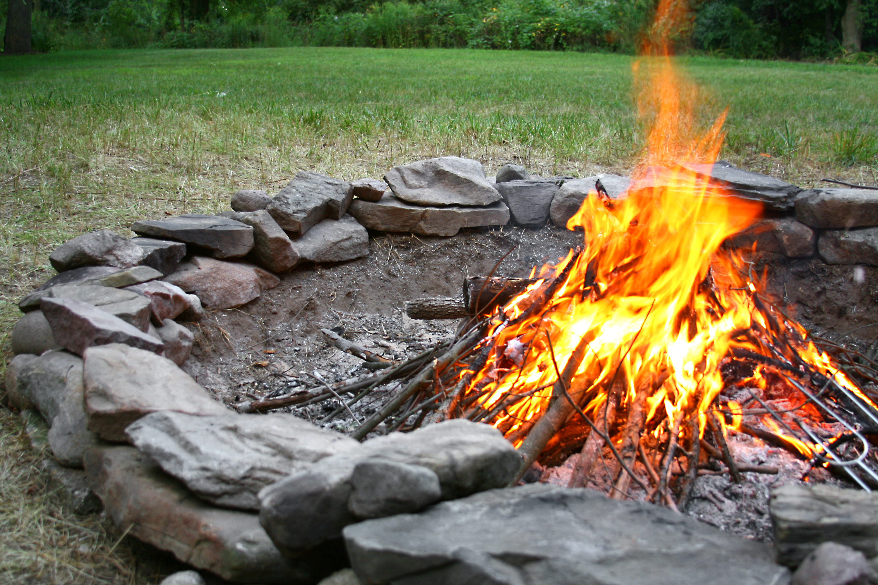 Twigs and branches burning in a fire pit