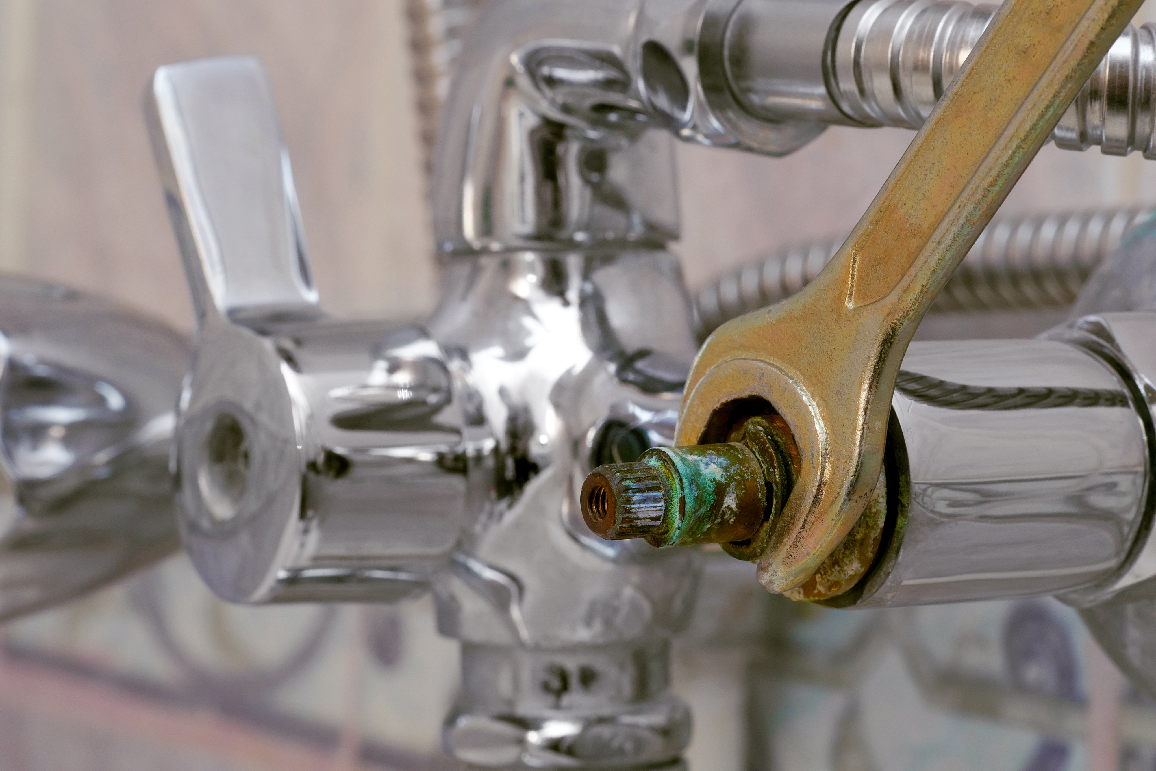 Close-up of a shower cartridge being replaced