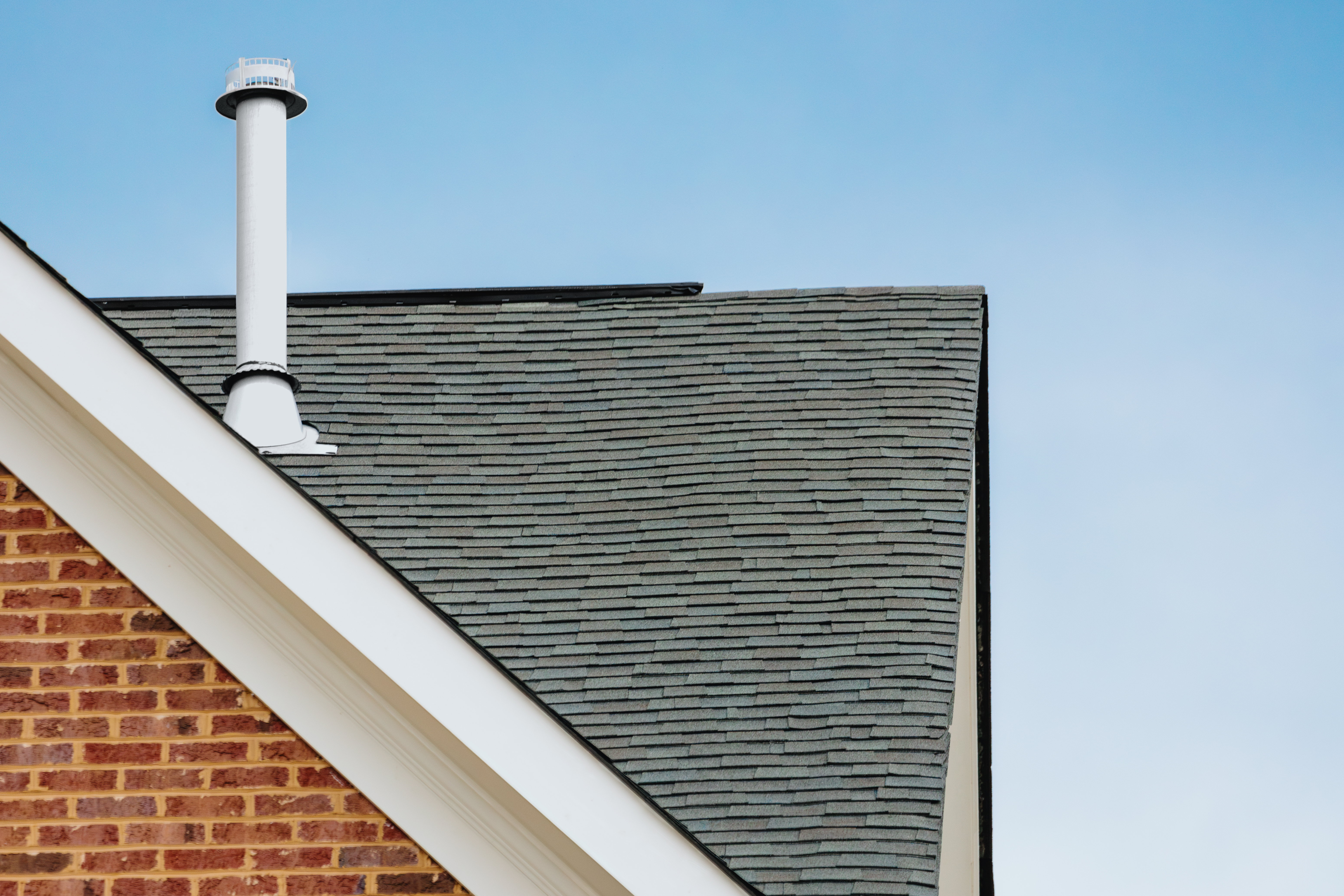 Asphalt shingles and vent on roof