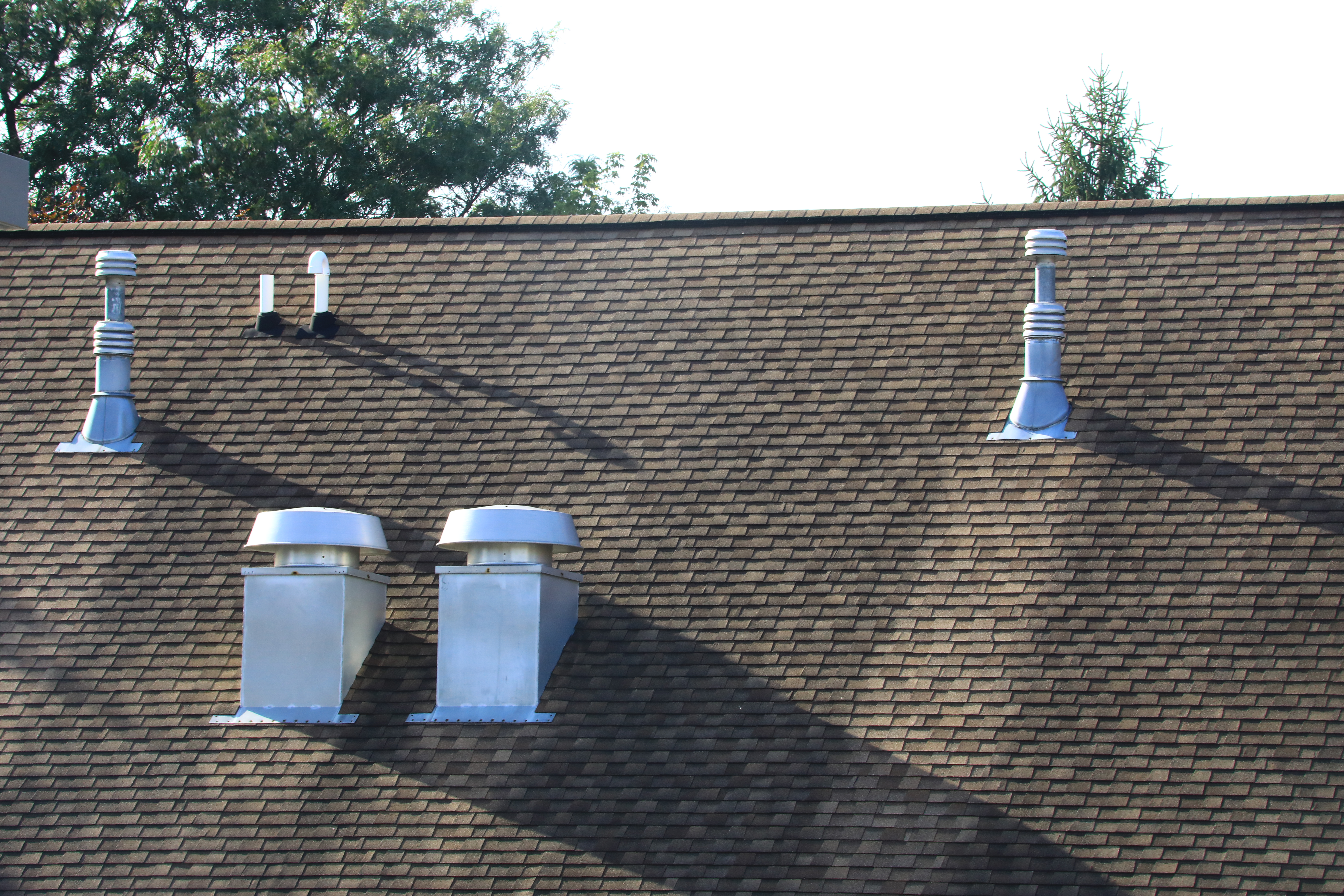 Slanted roof with an assortment of vents