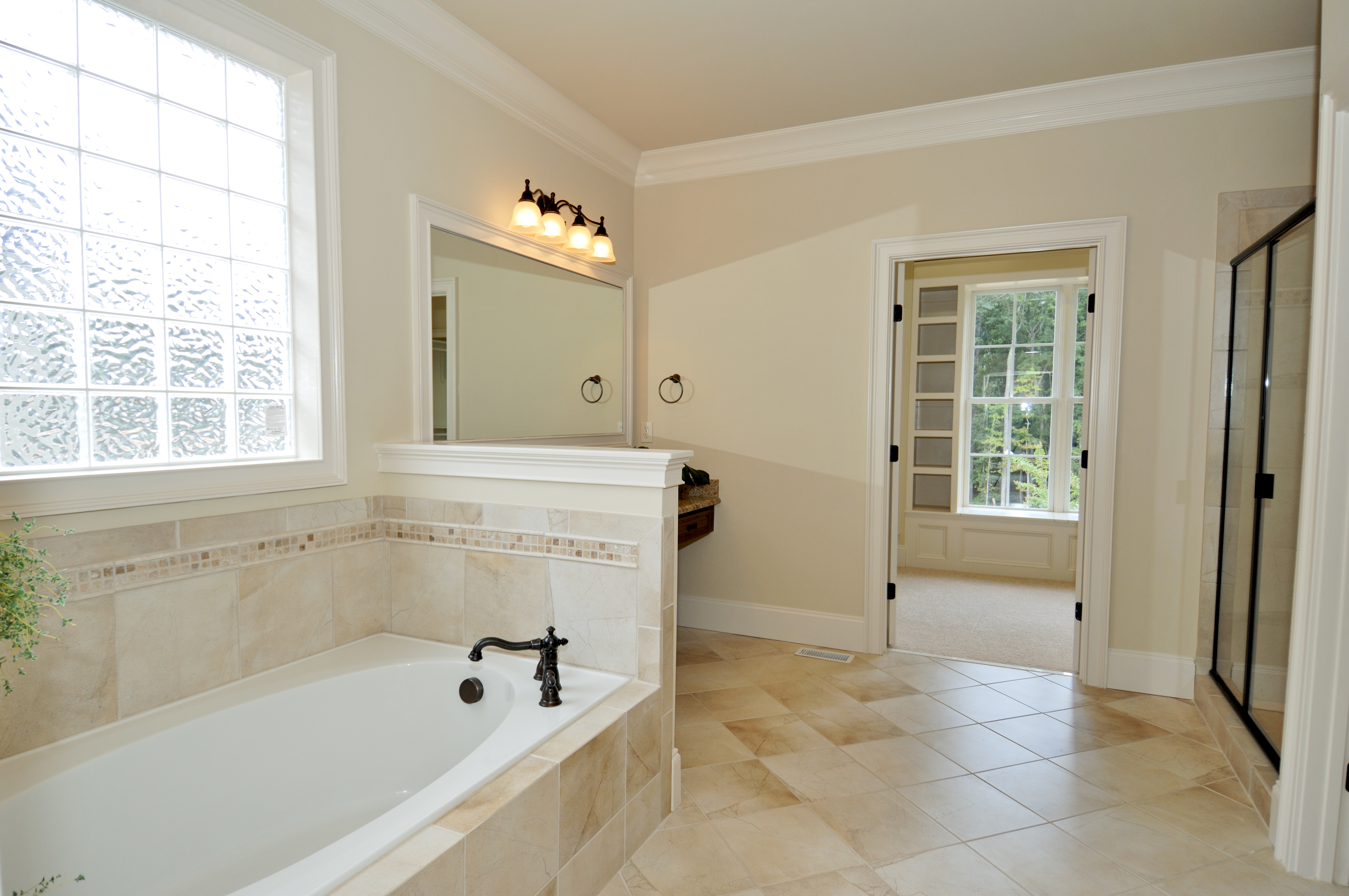 Luxury master bathroom with roman tub 