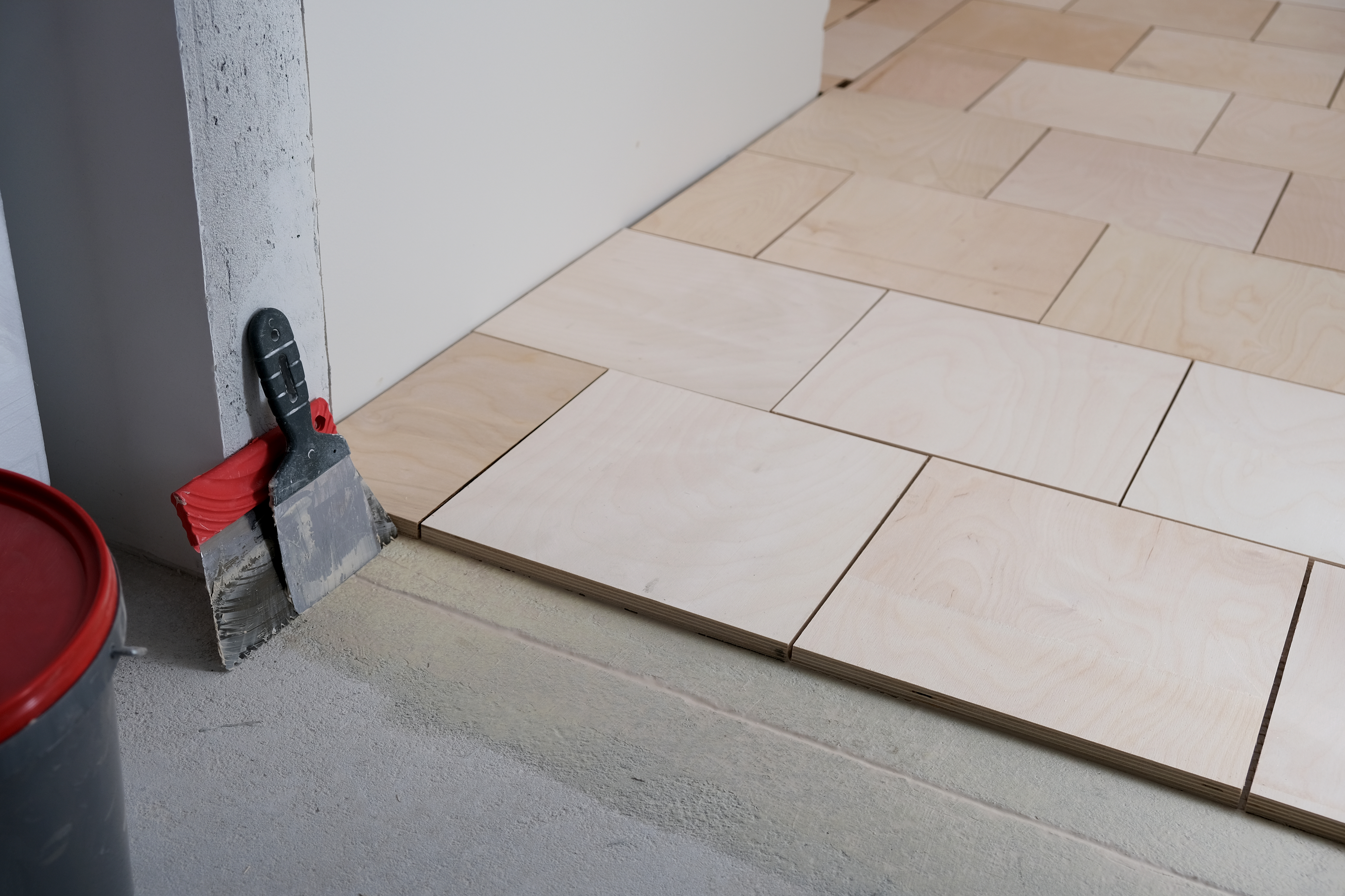 Tiles installation over concrete flooring