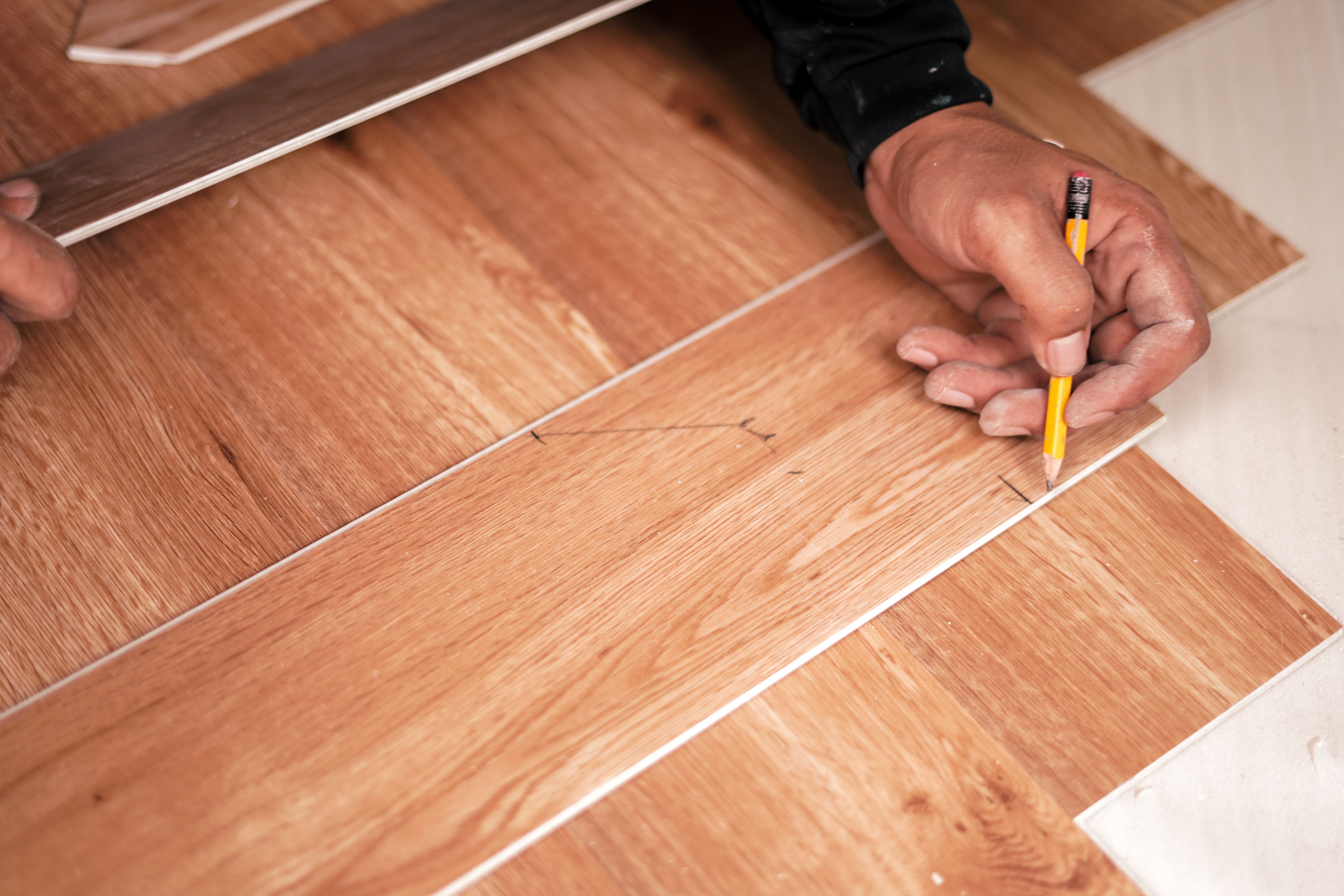 Man writing on pvc floor 