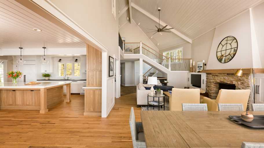 A contemporary kitchen dining room and living room