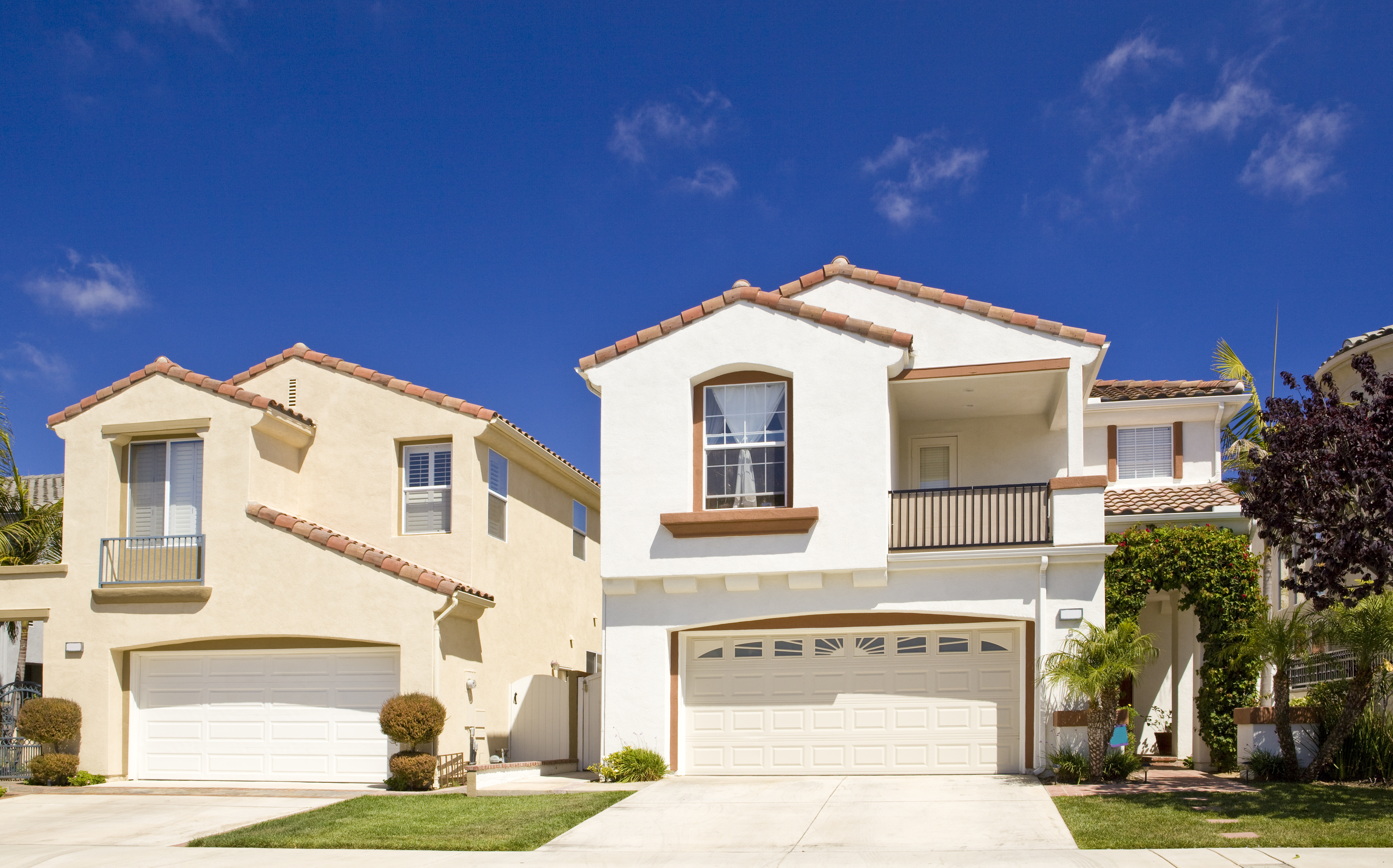 California houses with balconies and stucco siding