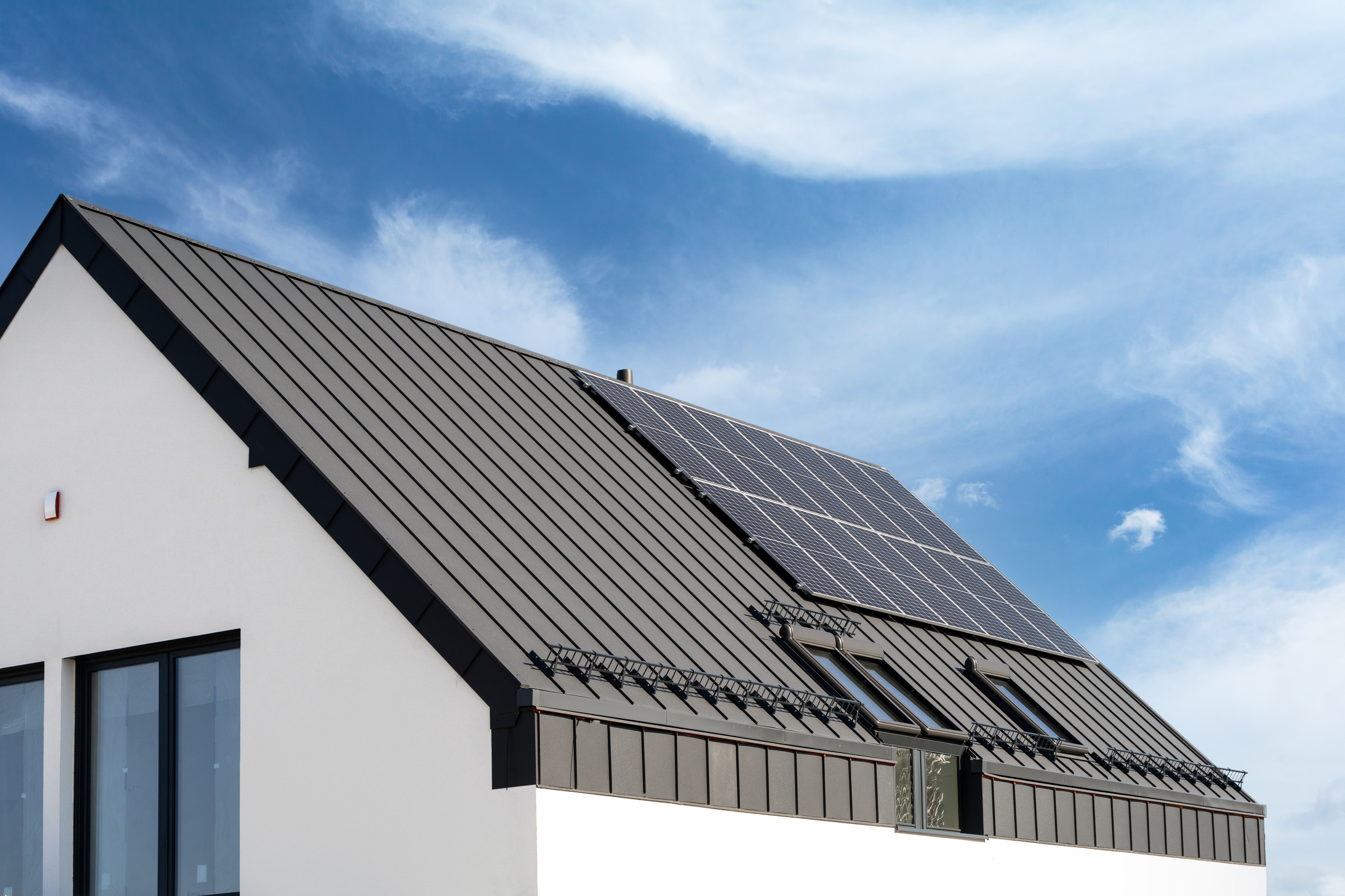 metal roof on white house