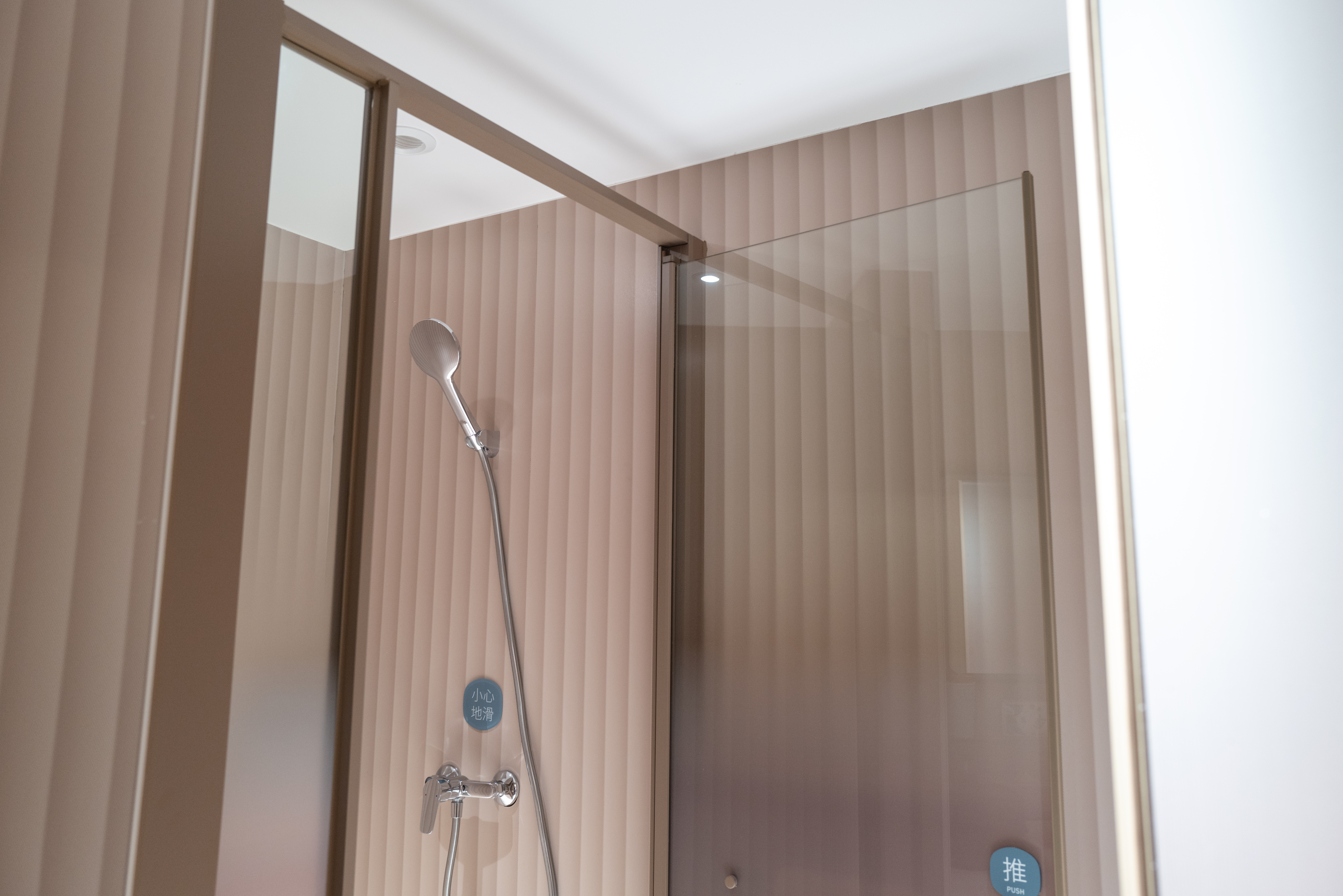 Shower head in the bathroom of the apartment 