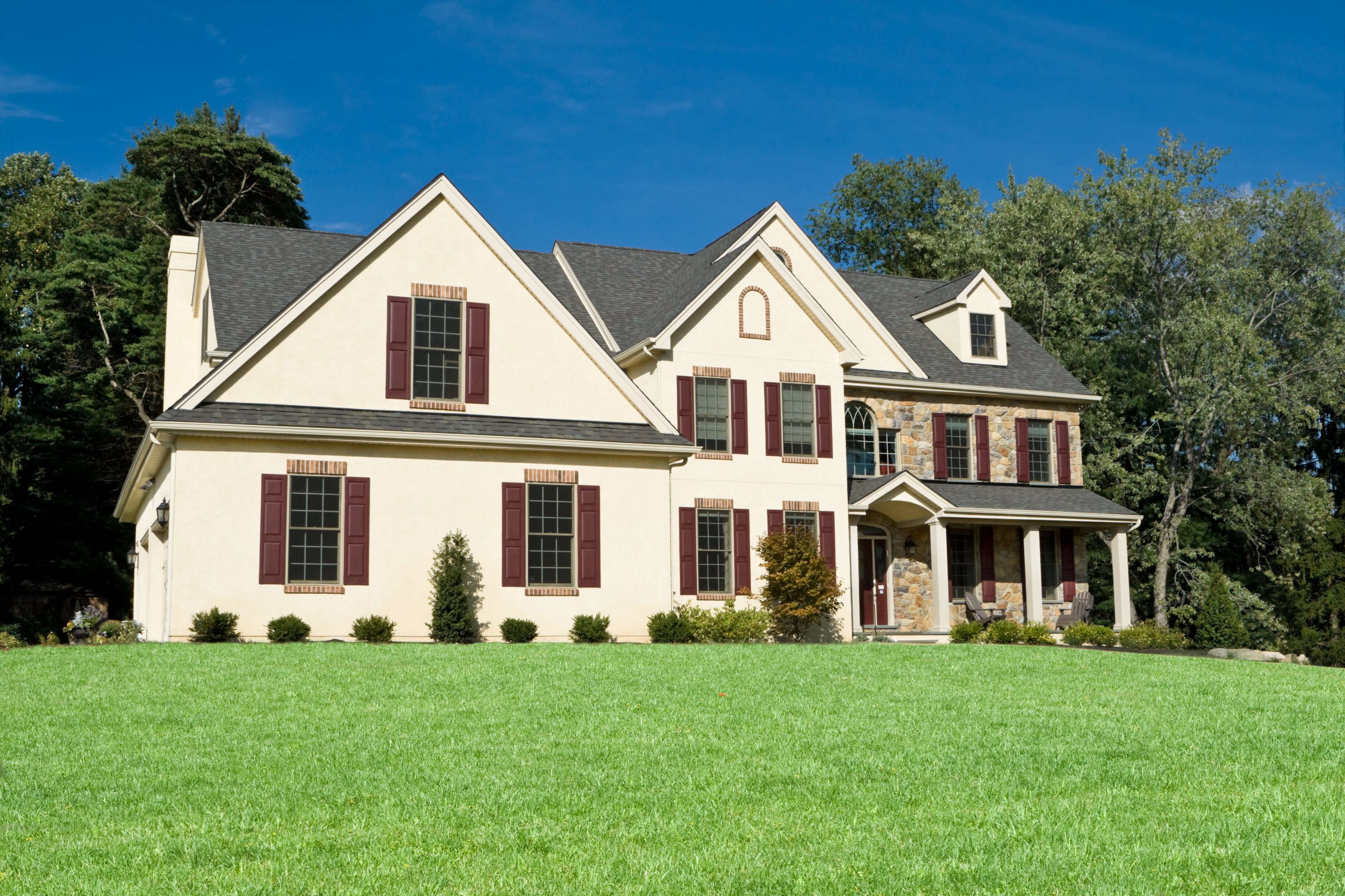 suburban philly  house with many windows