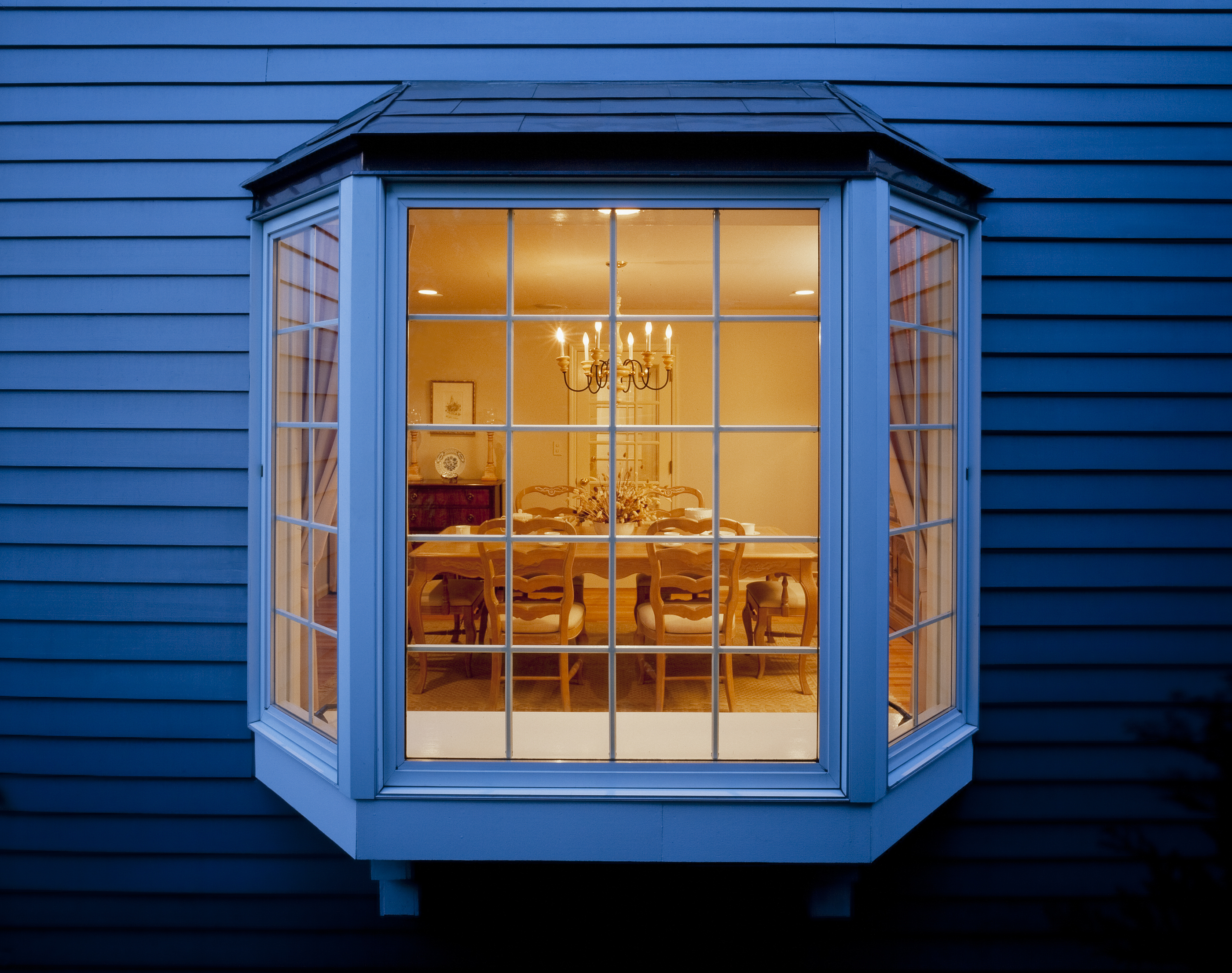 A bay window at dusk
