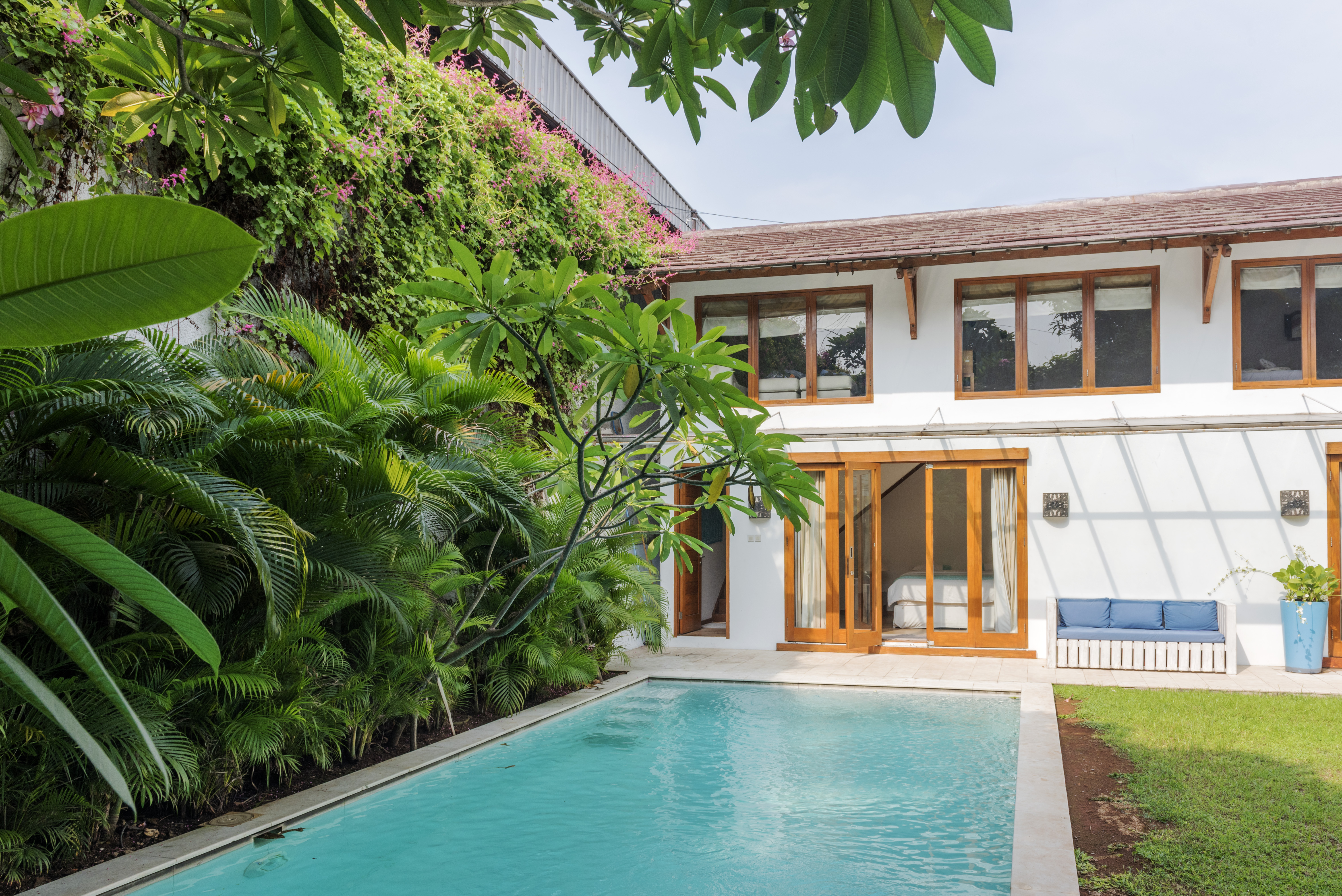A beautiful pool in the backyard of a house