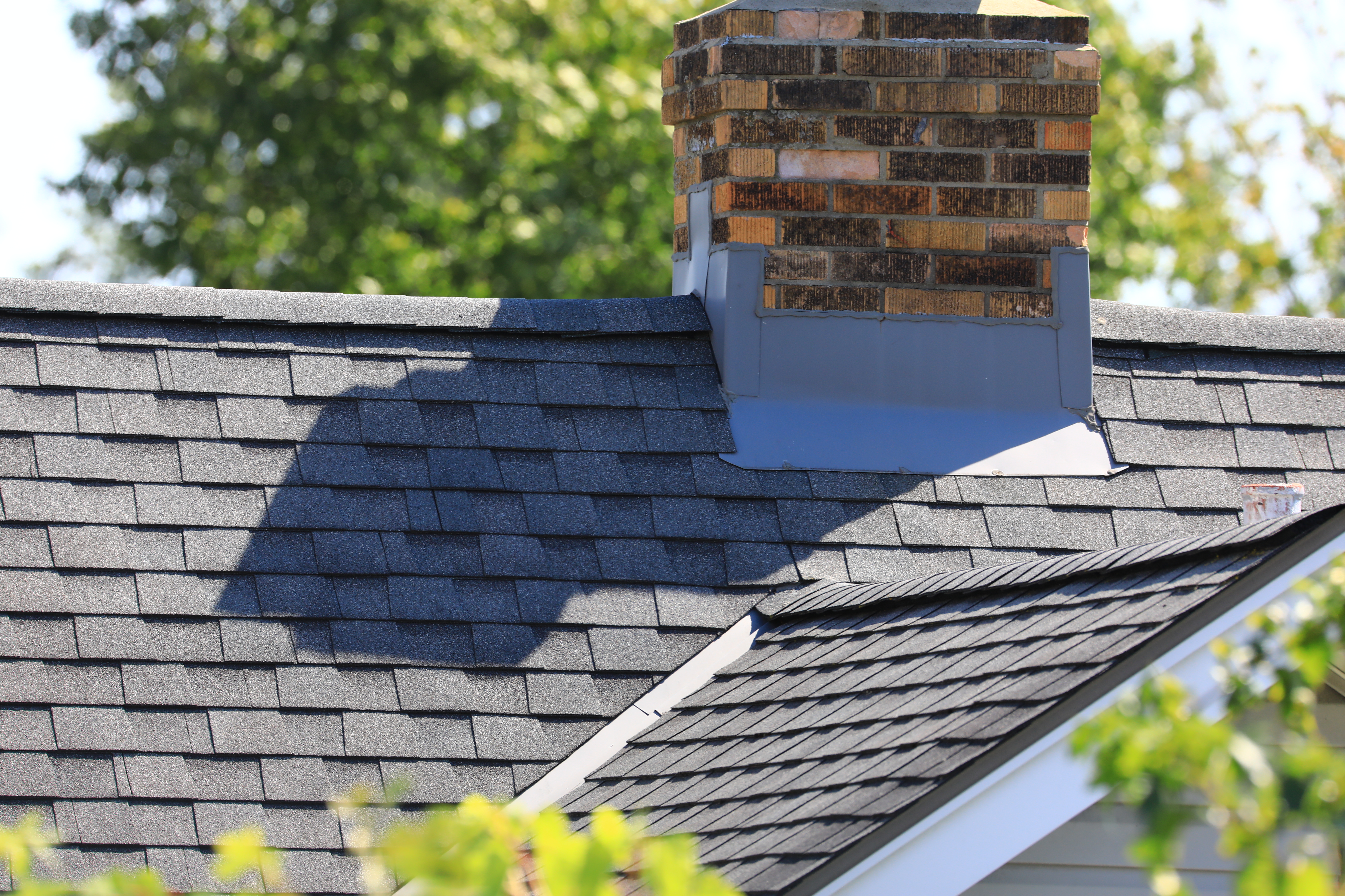 Roof with chimney and flashing 
