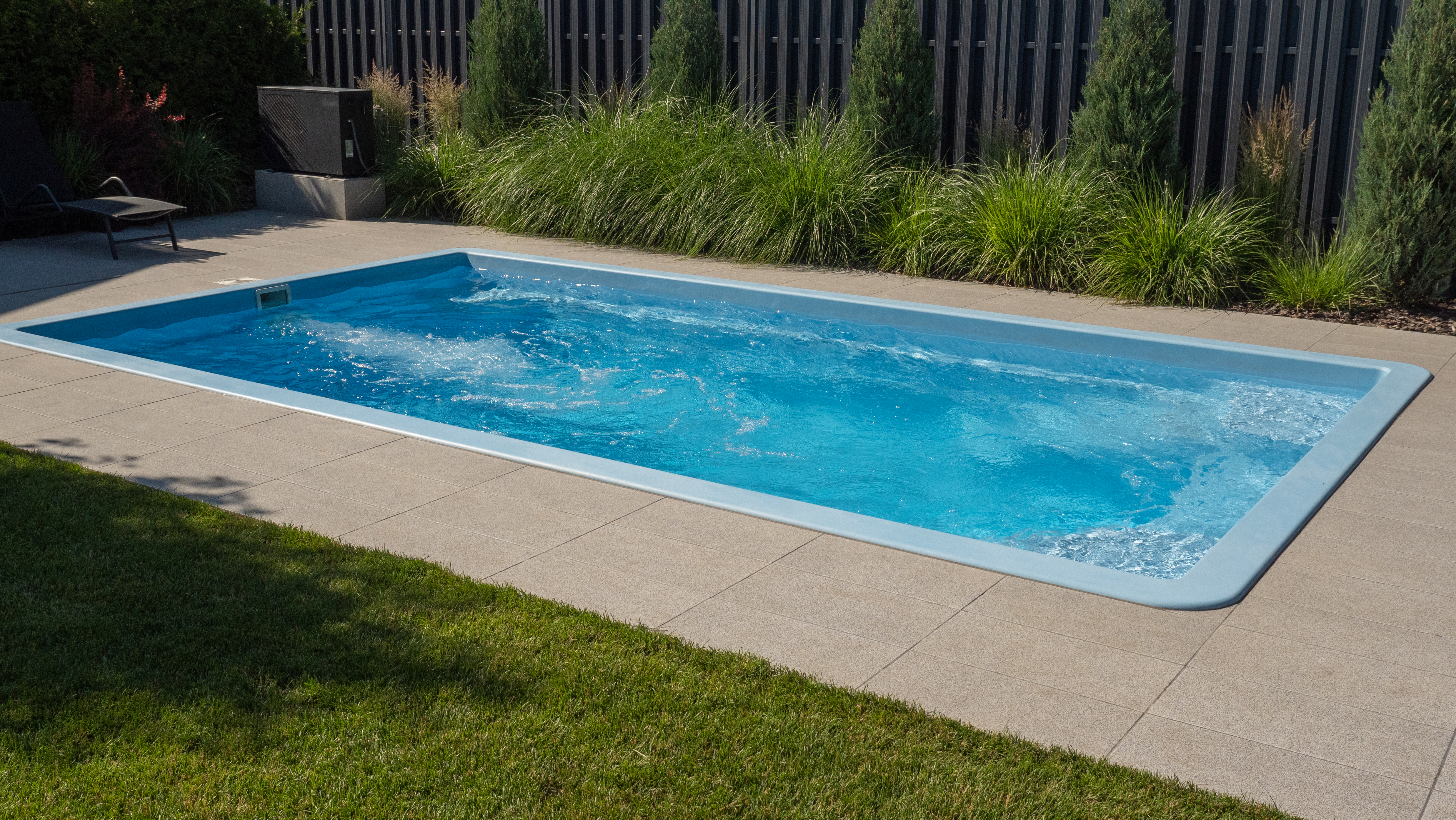 small swimming pool in backyard